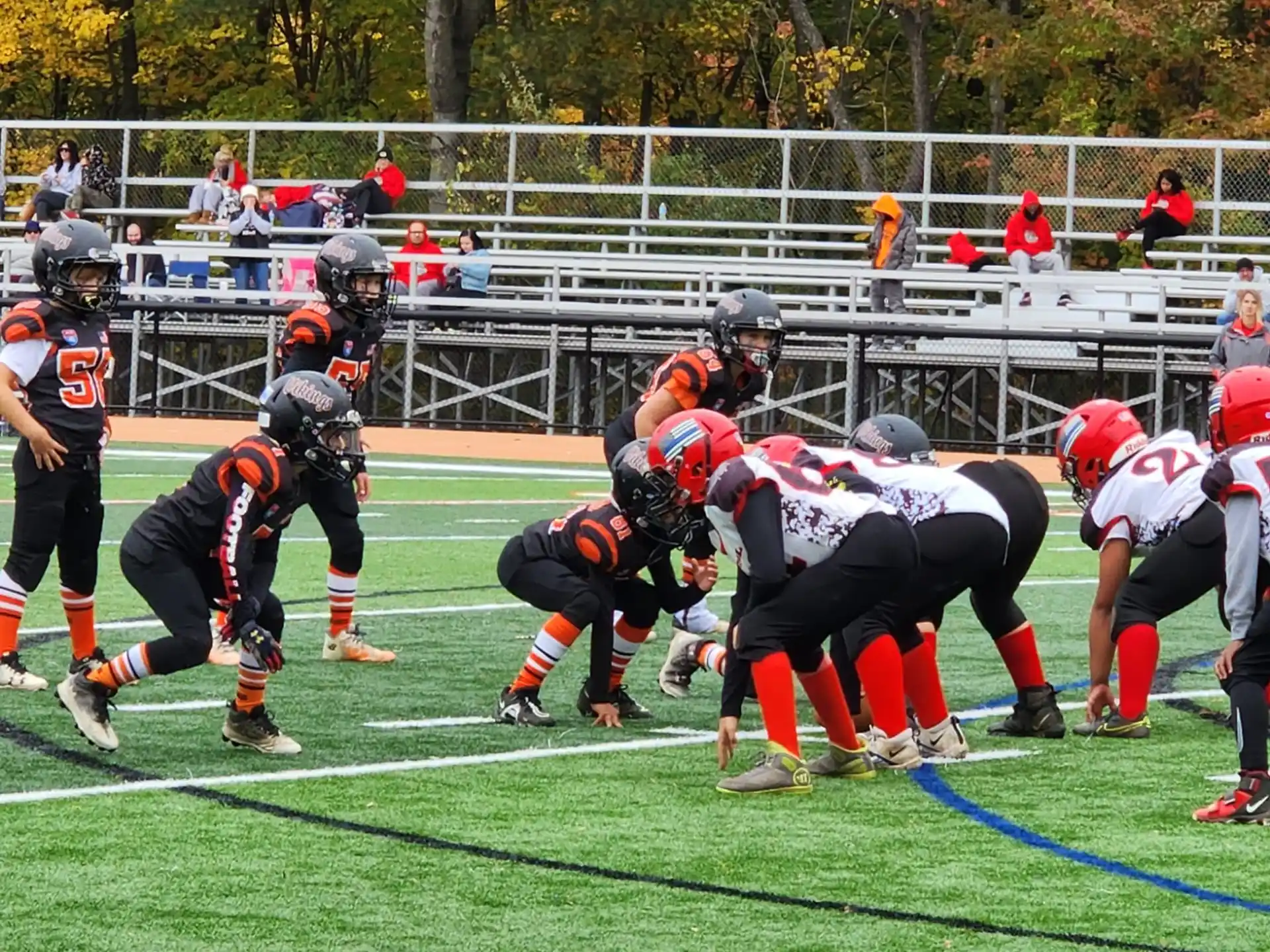 a group of people playing football