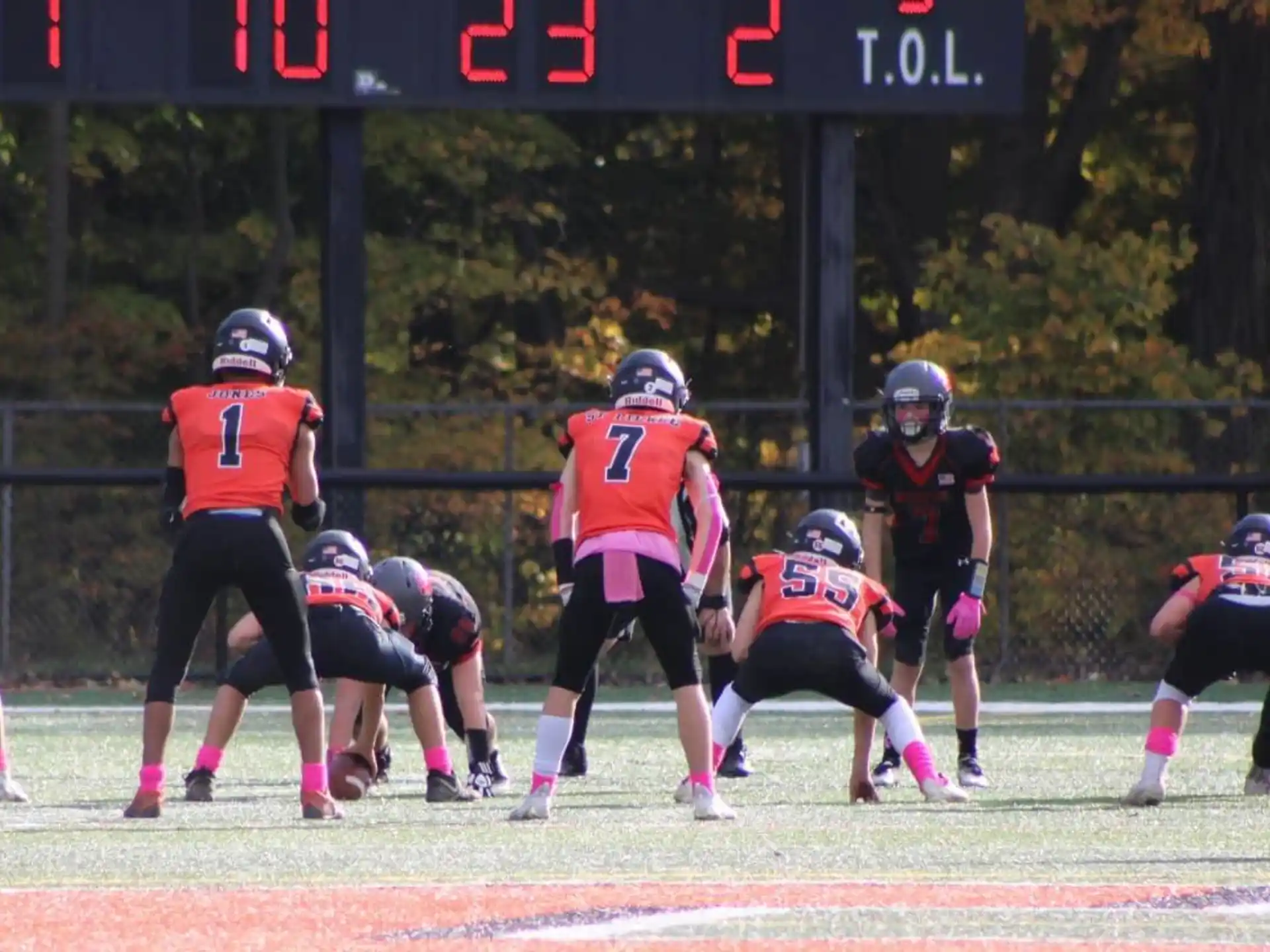 a group of people playing football