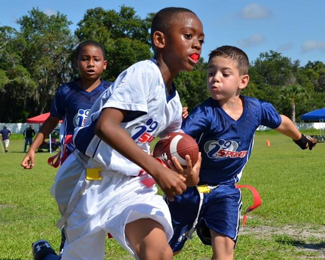 a group of boys playing football