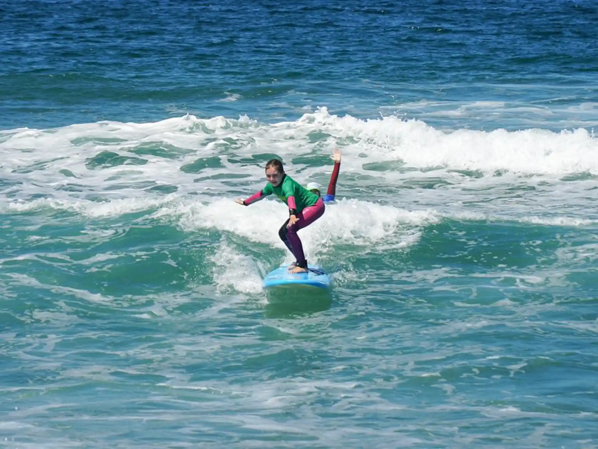 a person surfing on the waves