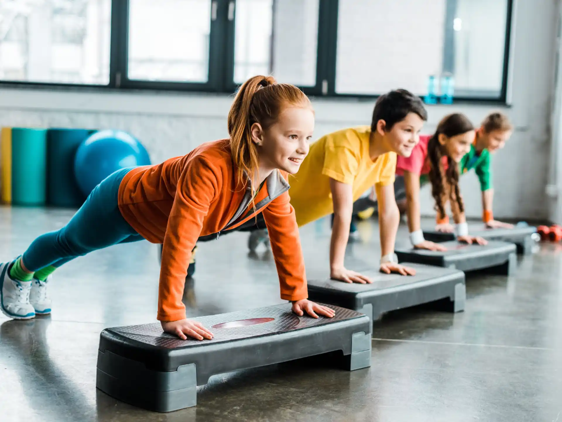a group of children exercising