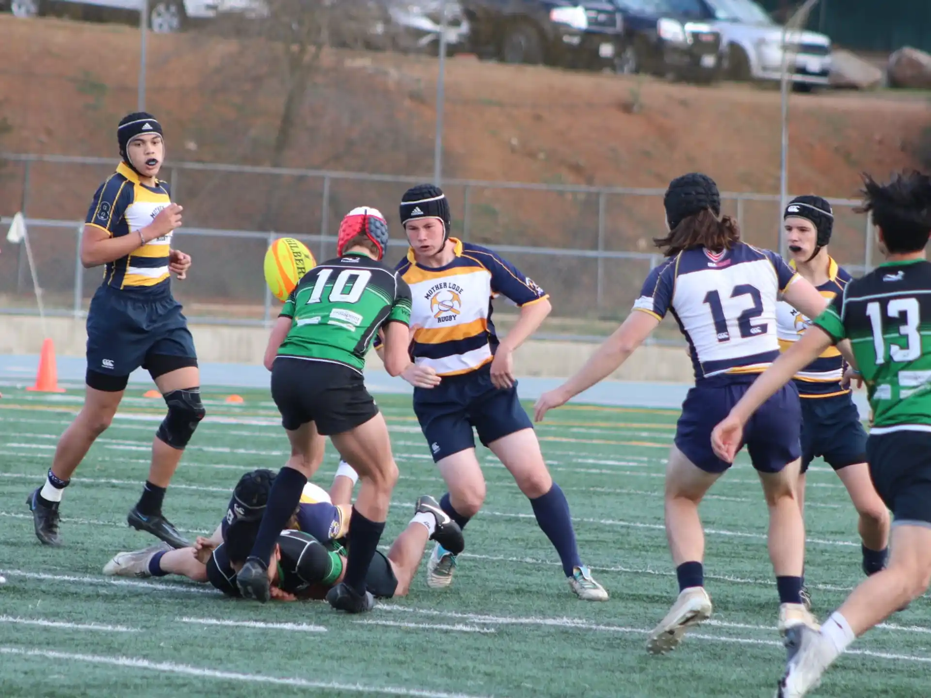 a group of people playing rugby