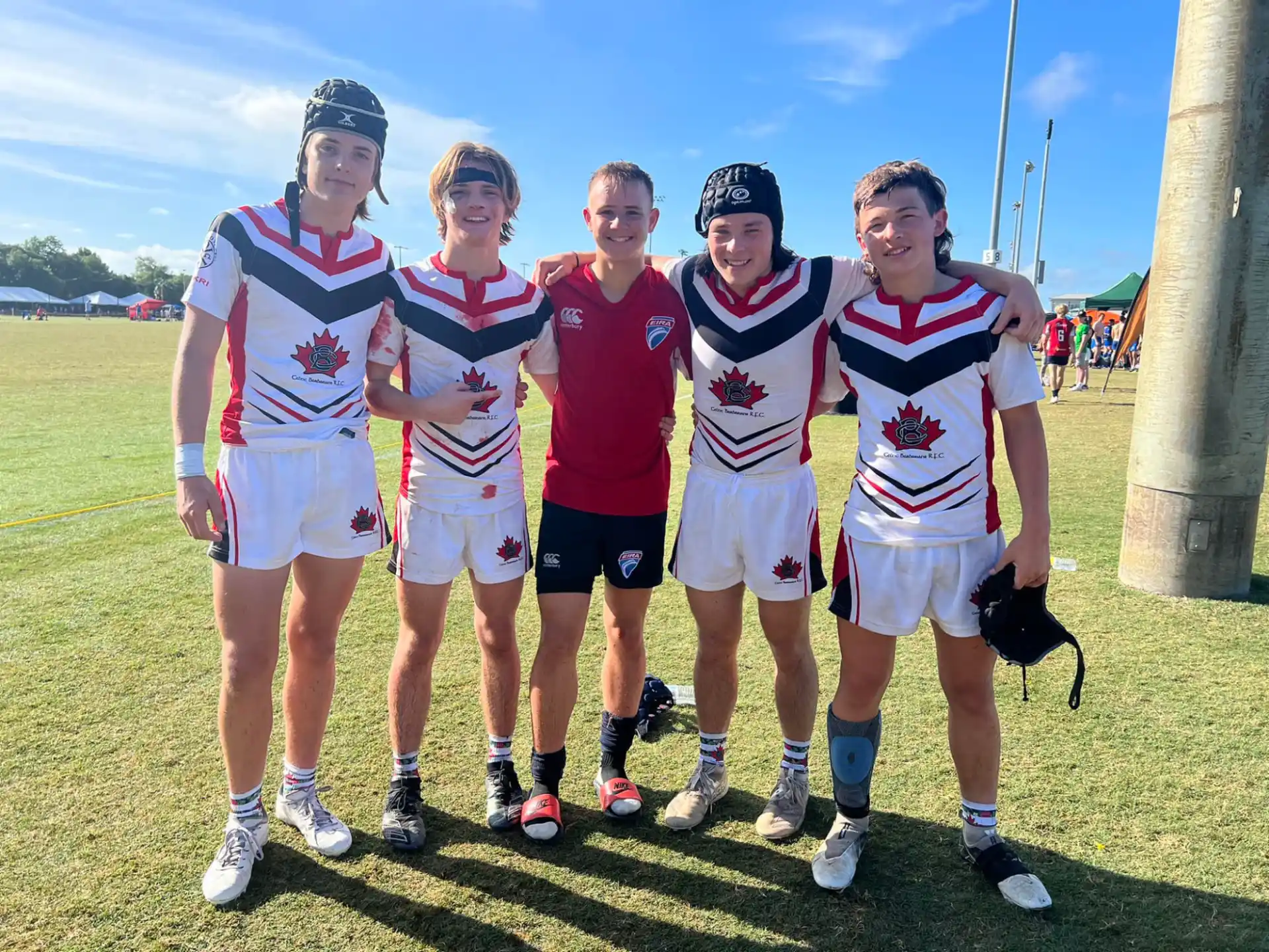 a group of people wearing sports uniforms