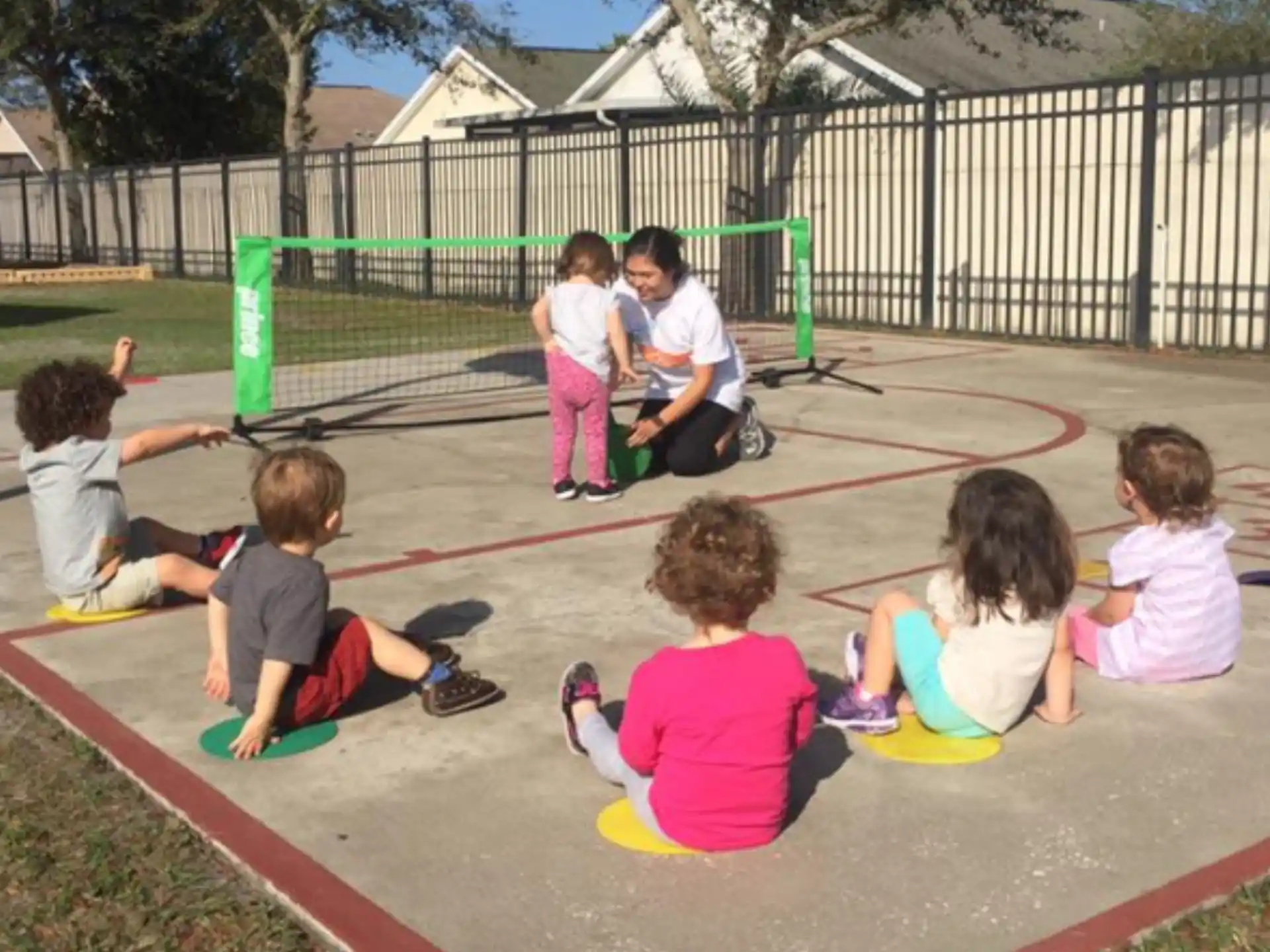a group of children playing on a playground
