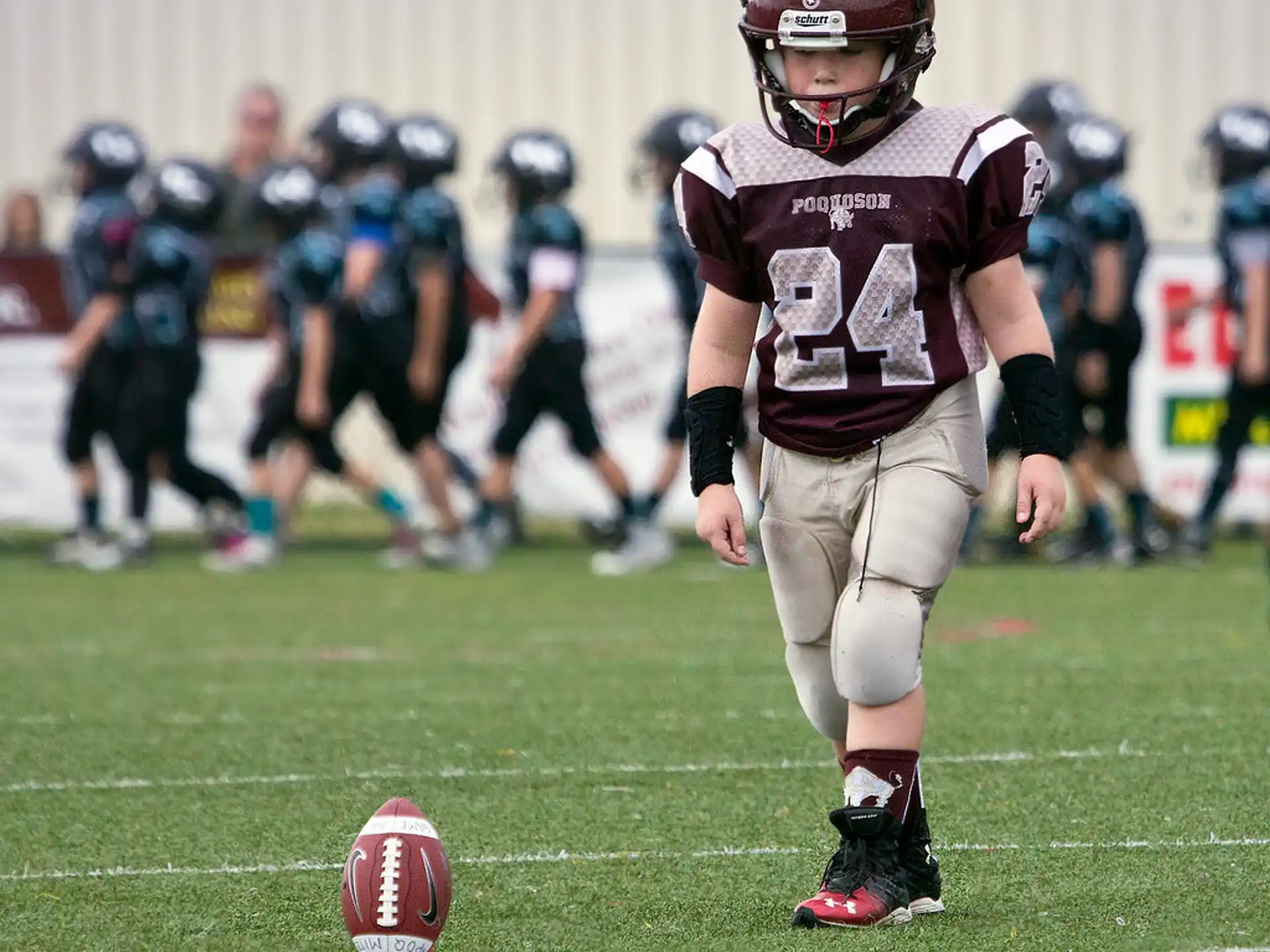 a football player in a red uniform