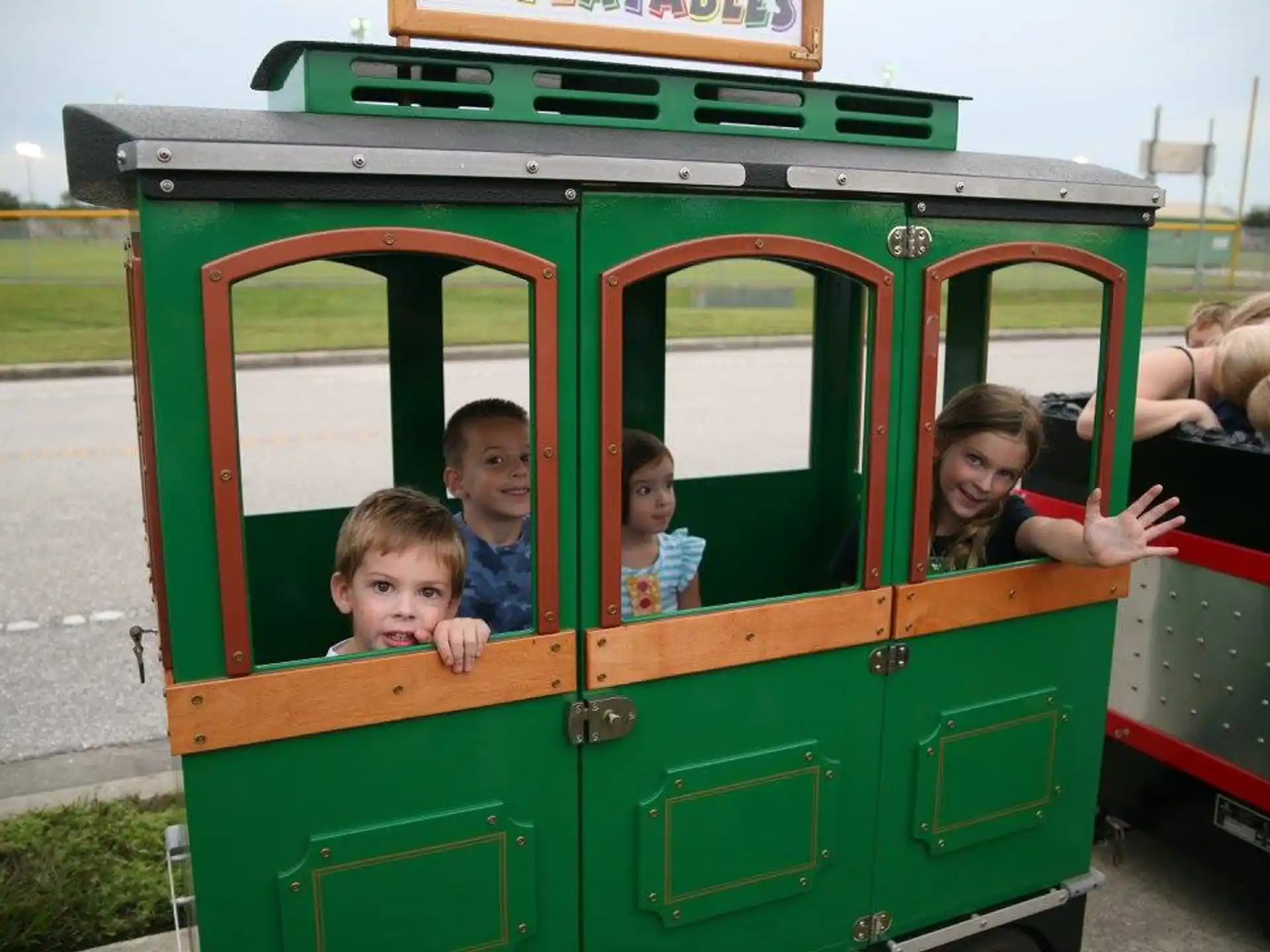 a group of children on a train
