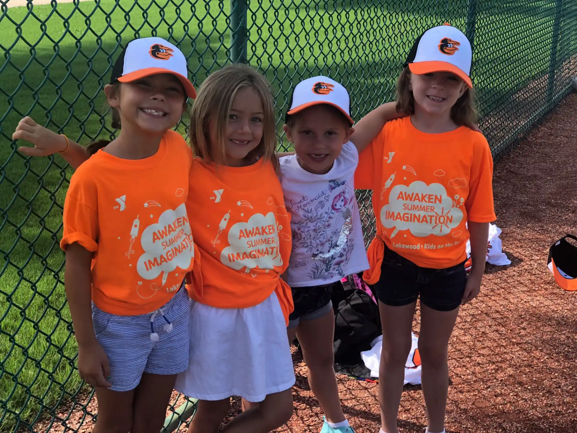 a group of kids wearing matching t-shirts
