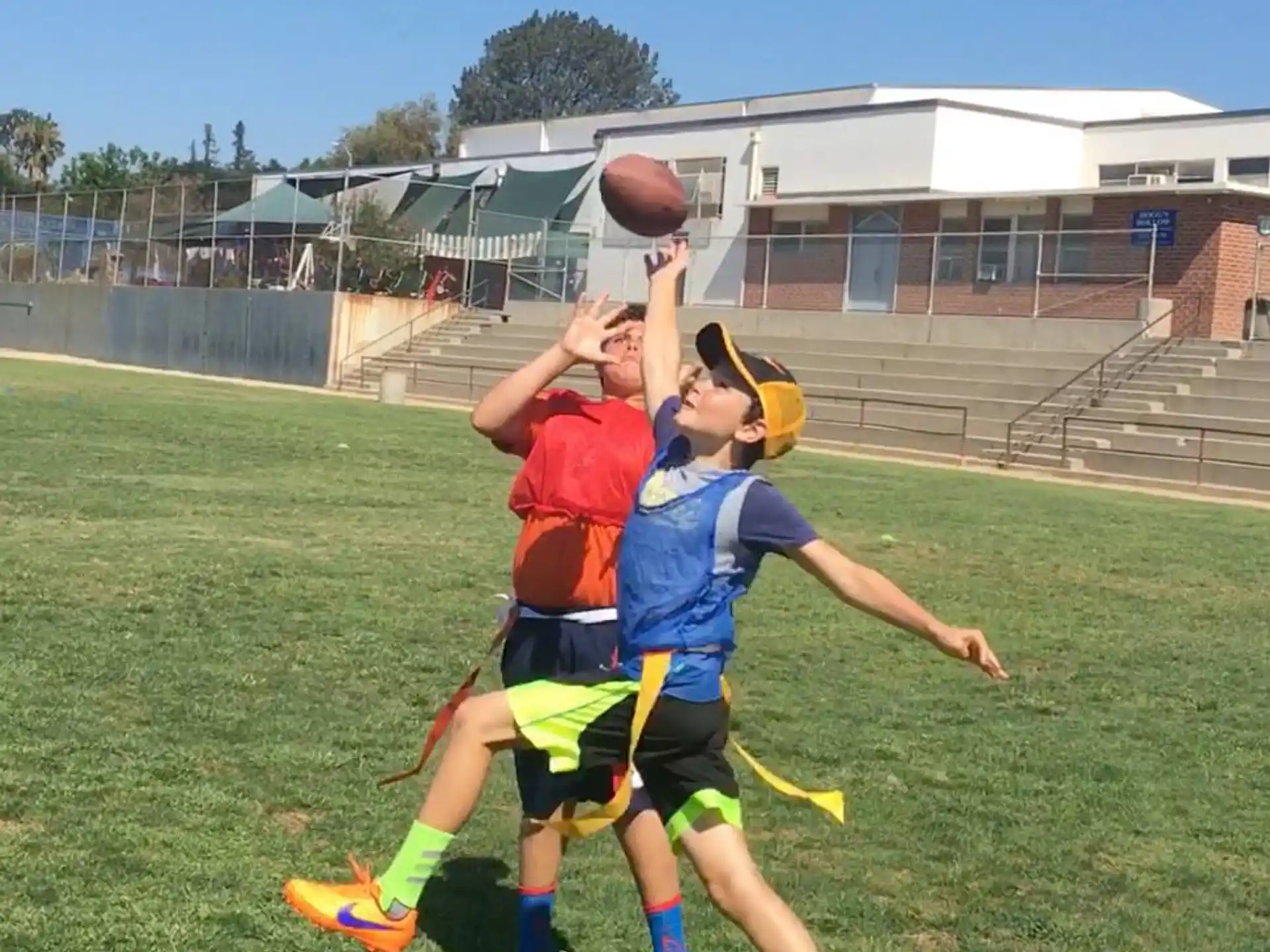a group of people playing basketball