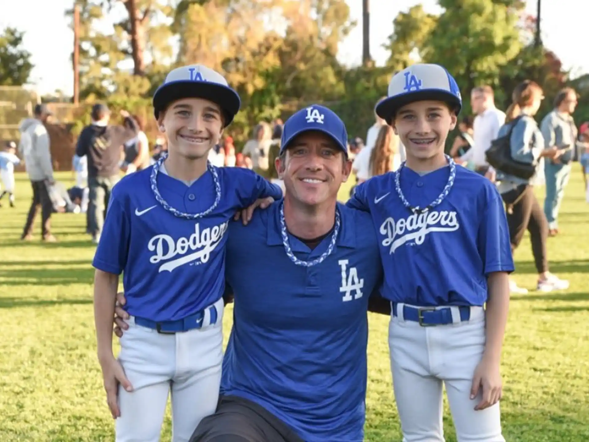 a group of people wearing baseball uniforms