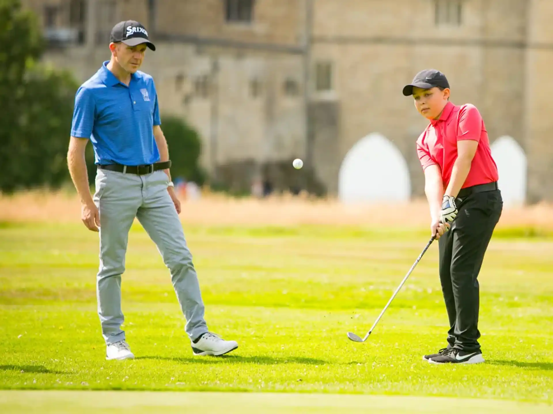 a couple of men playing golf