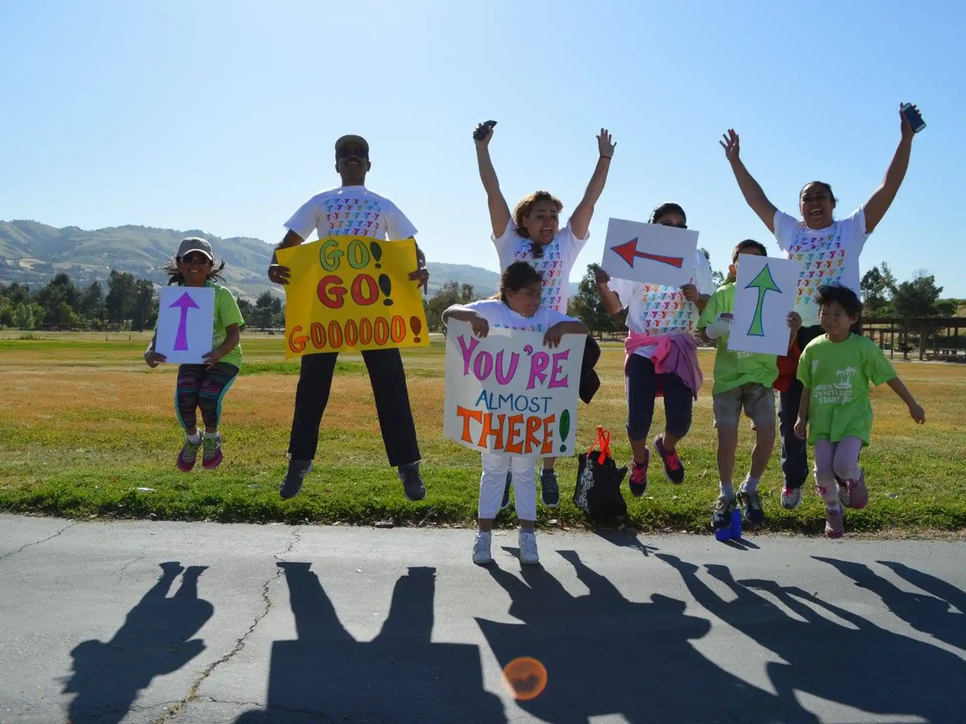a group of people holding signs