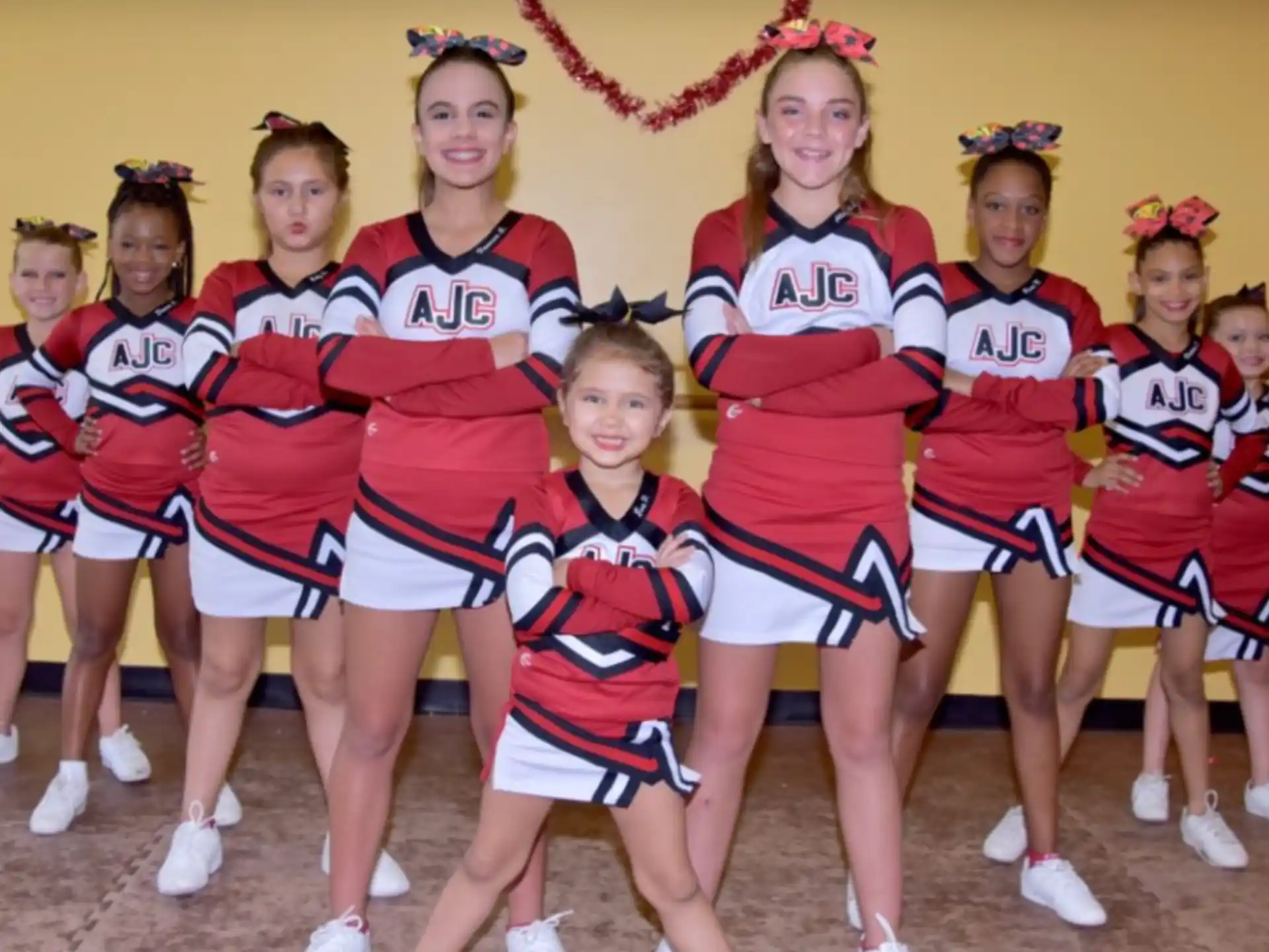 a group of girls in matching uniforms