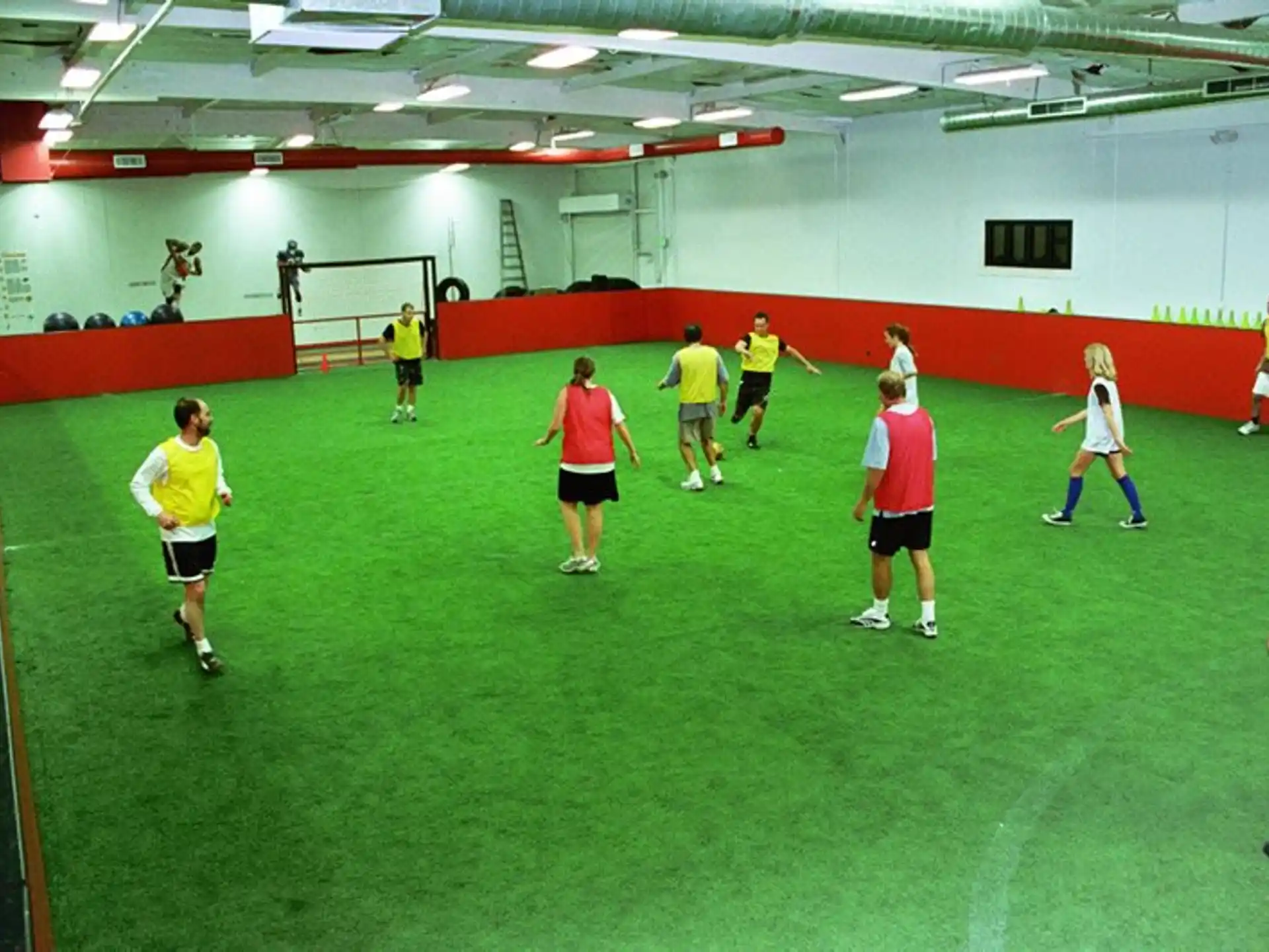 a group of people playing football