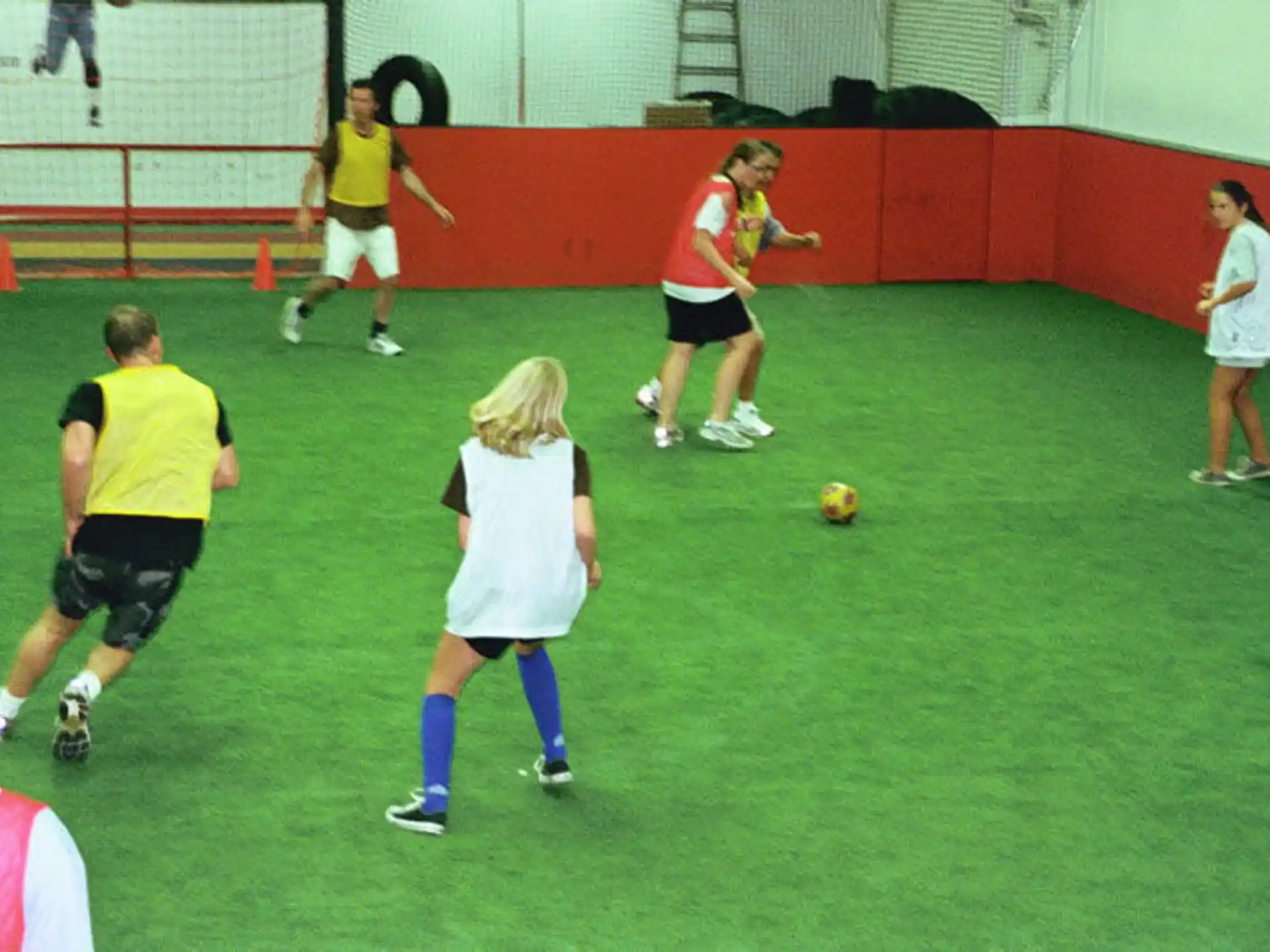 a group of people playing football