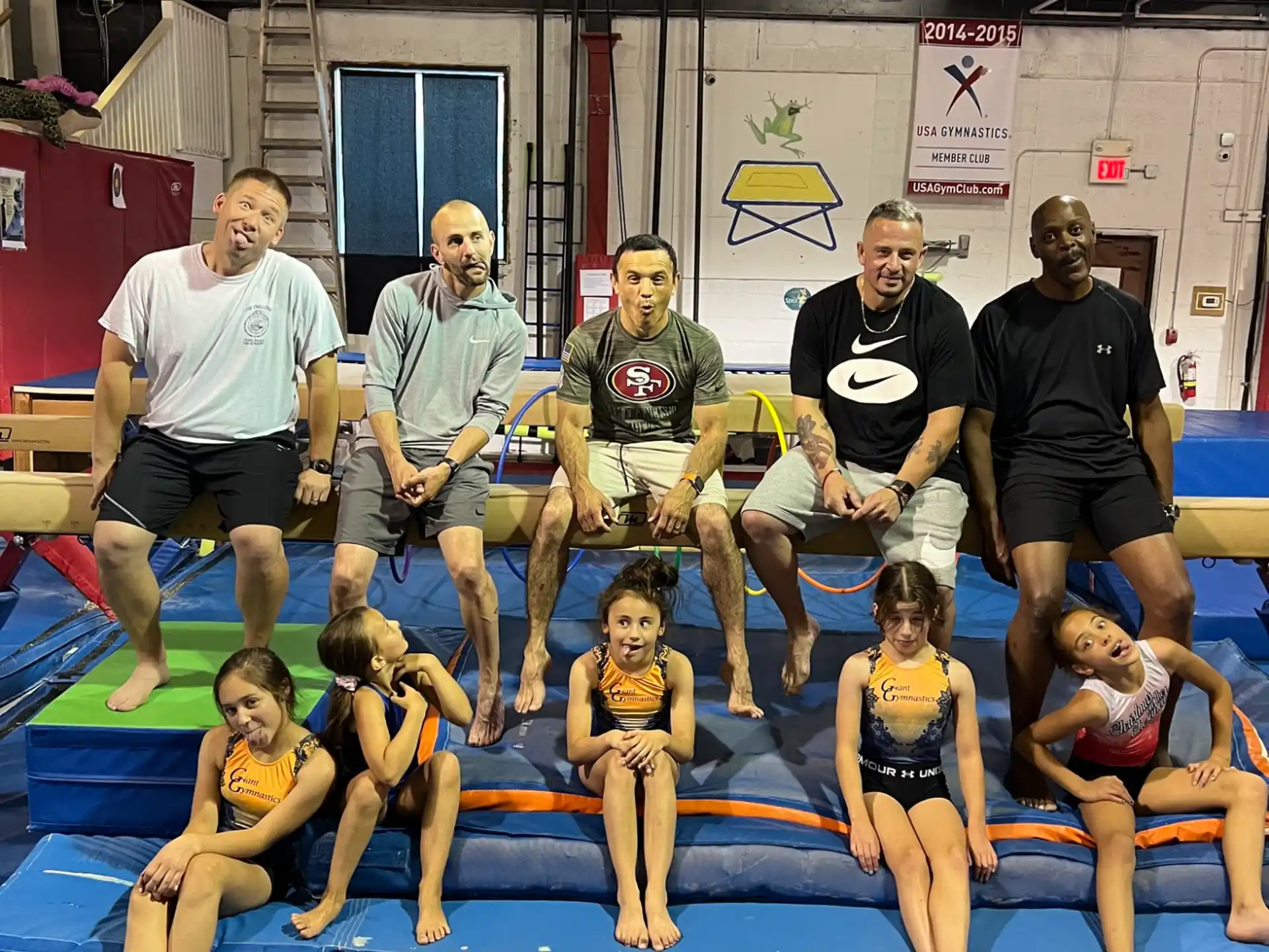 a group of people in a gym