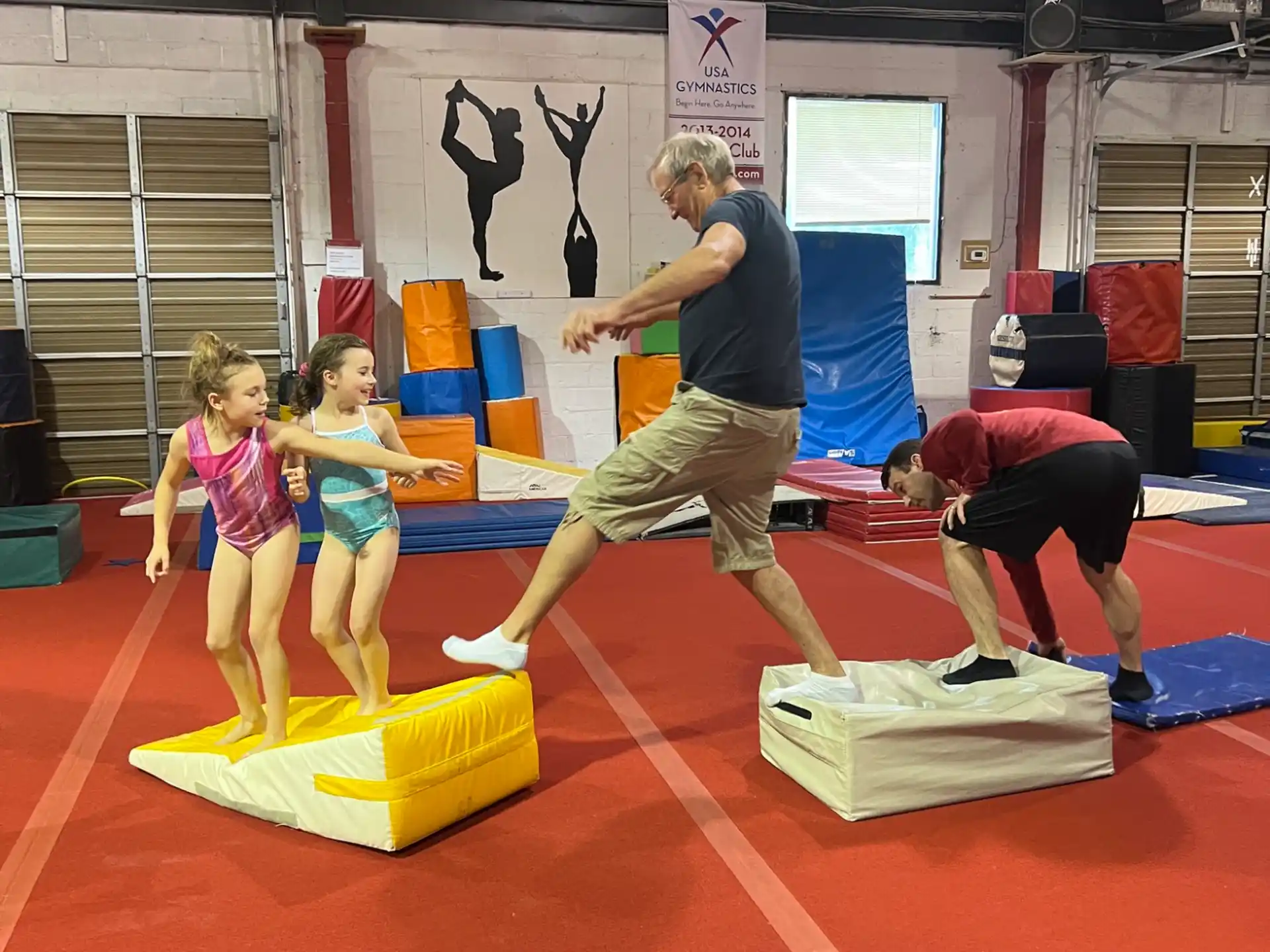 a group of people playing on mats