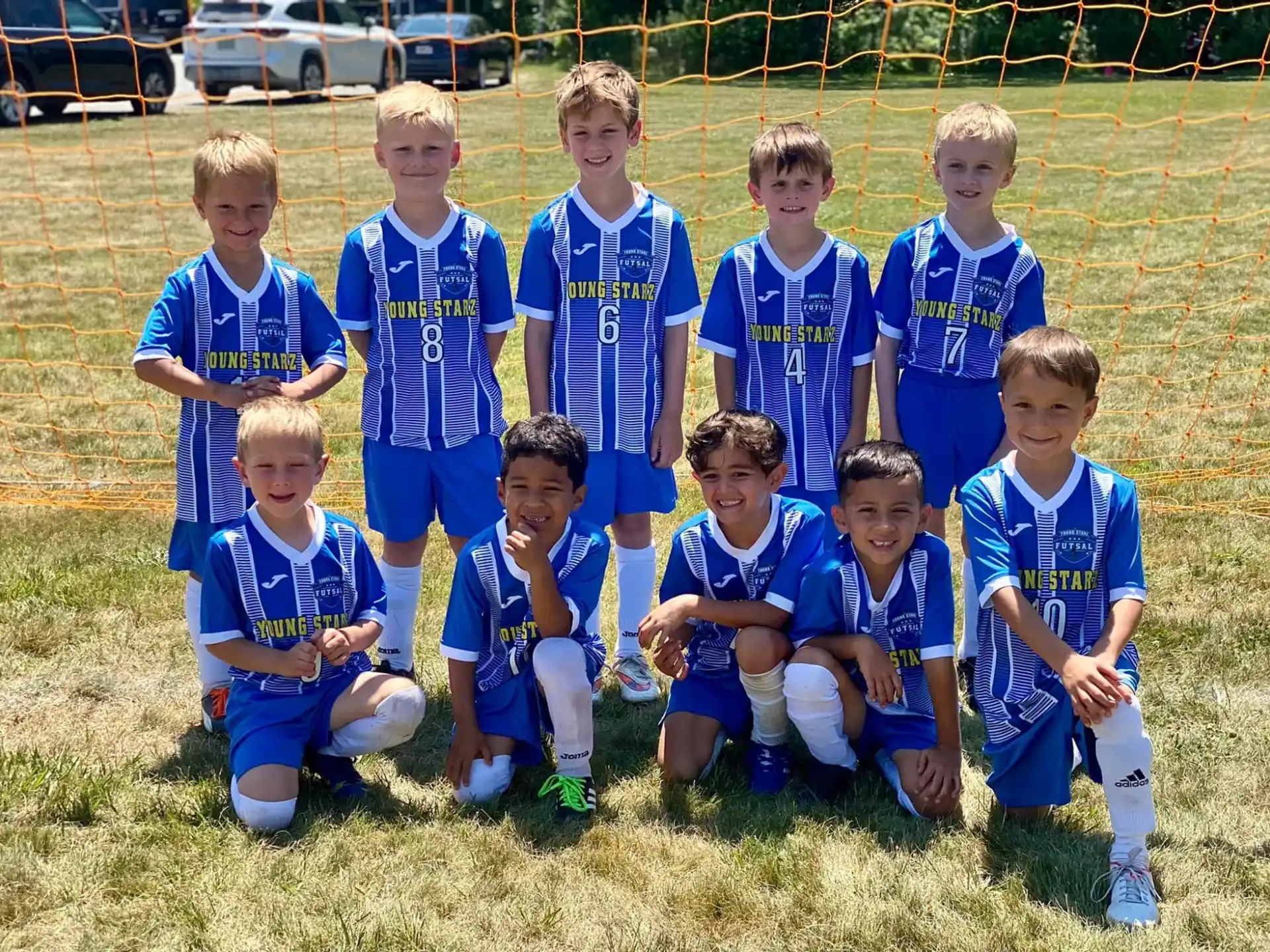 a group of boys in football uniforms