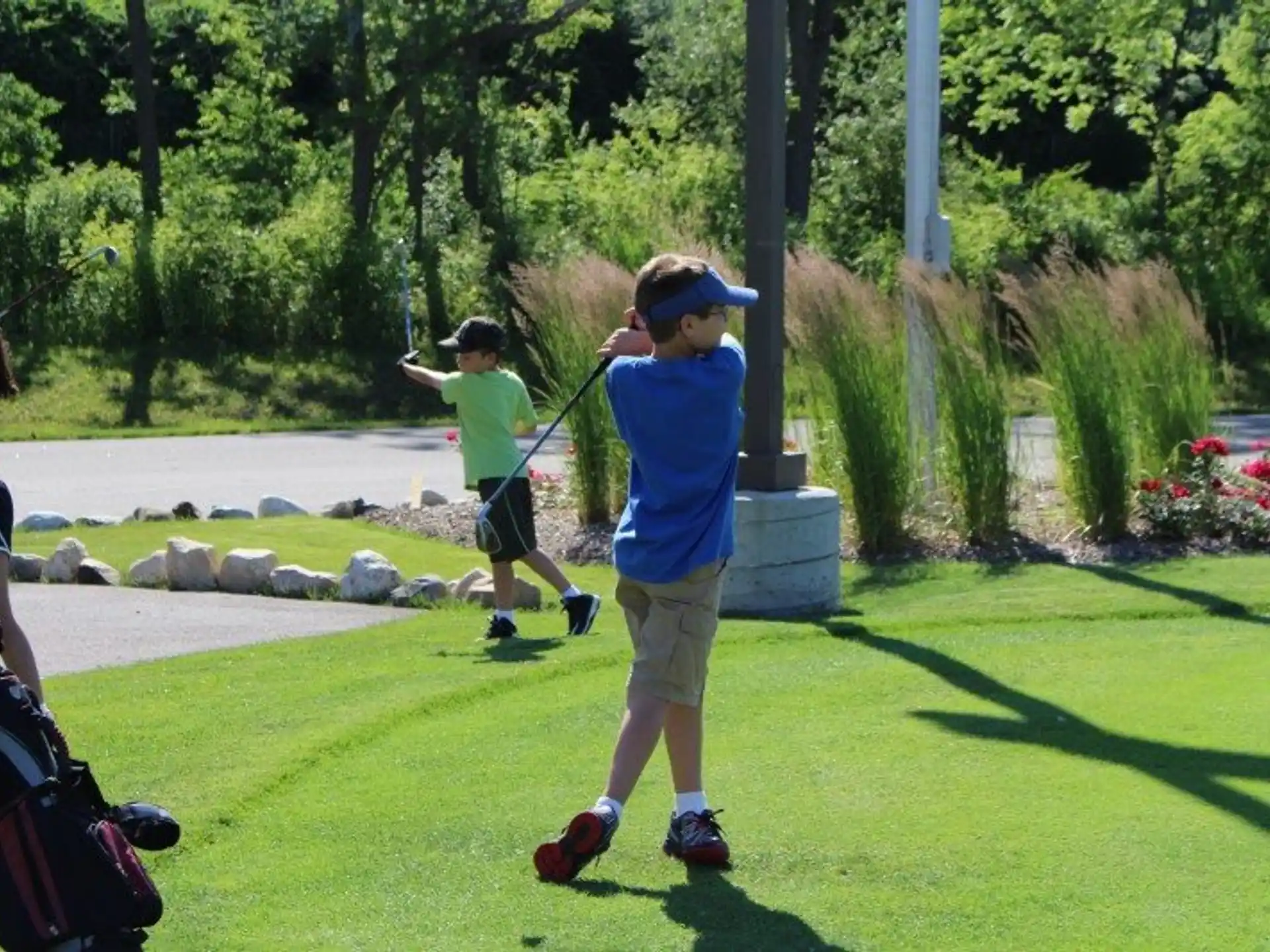 a group of people playing golf