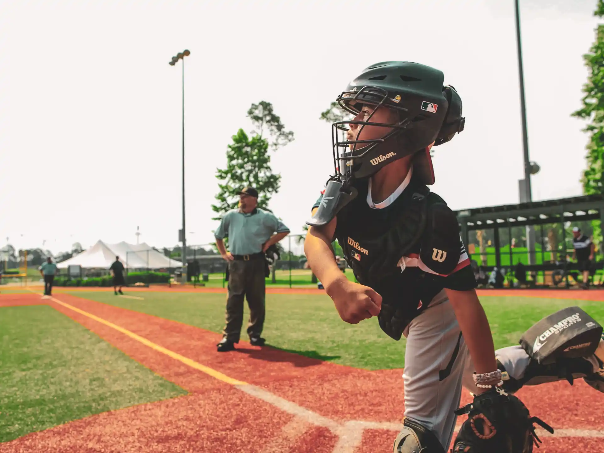 a baseball player prepares to swing a bat