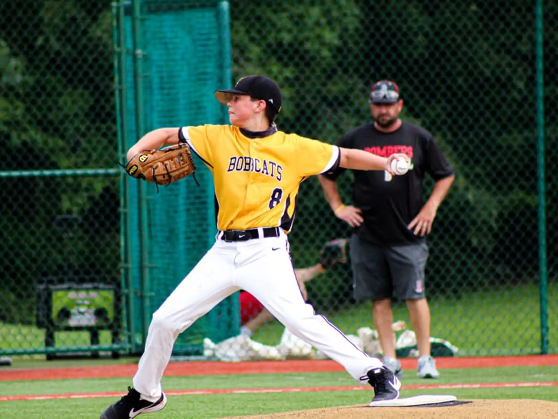 a baseball player throwing a ball