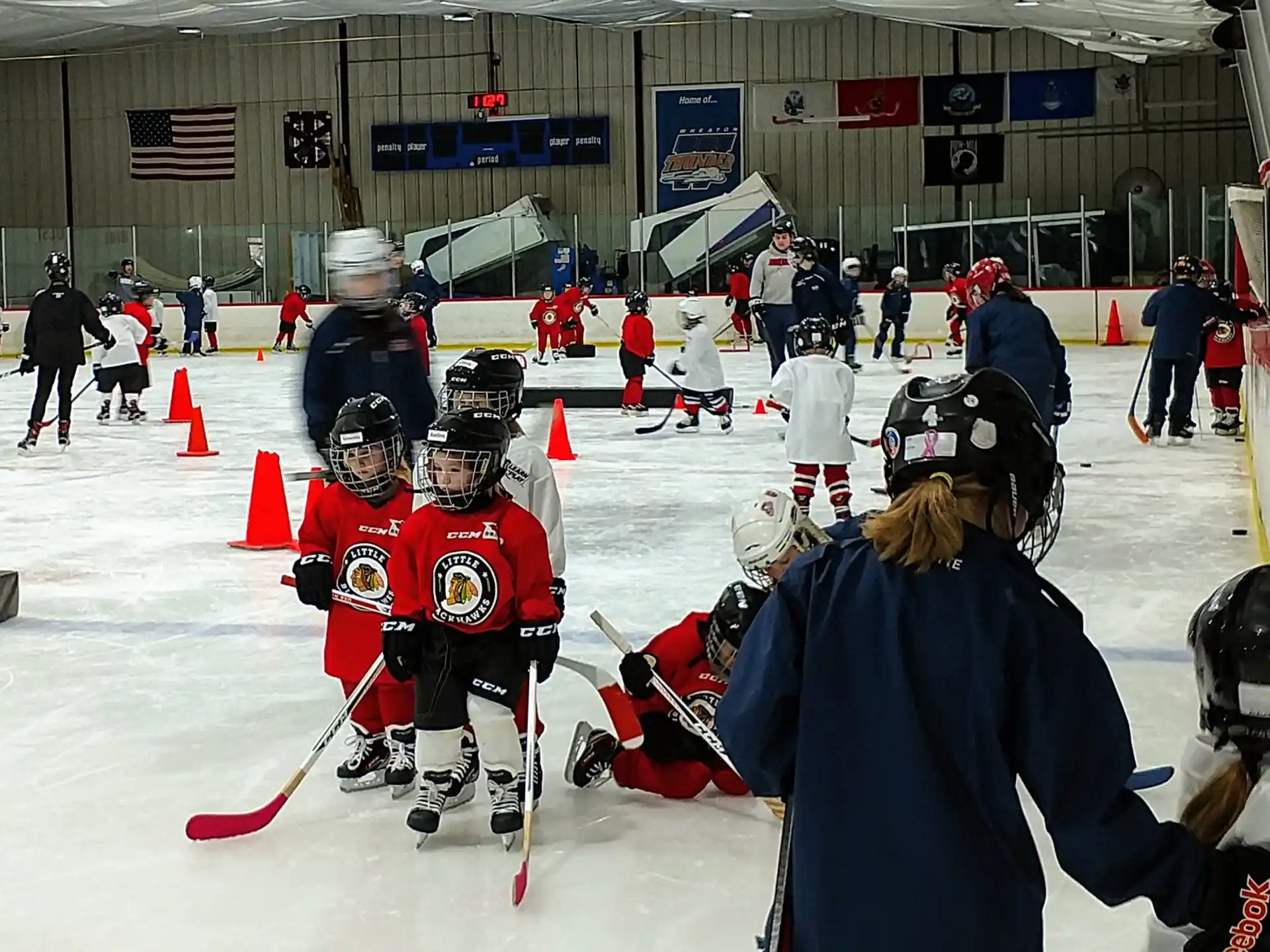 a group of people playing hockey