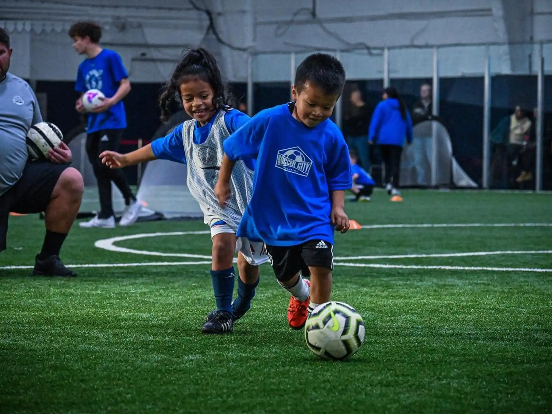 kids playing football on a field