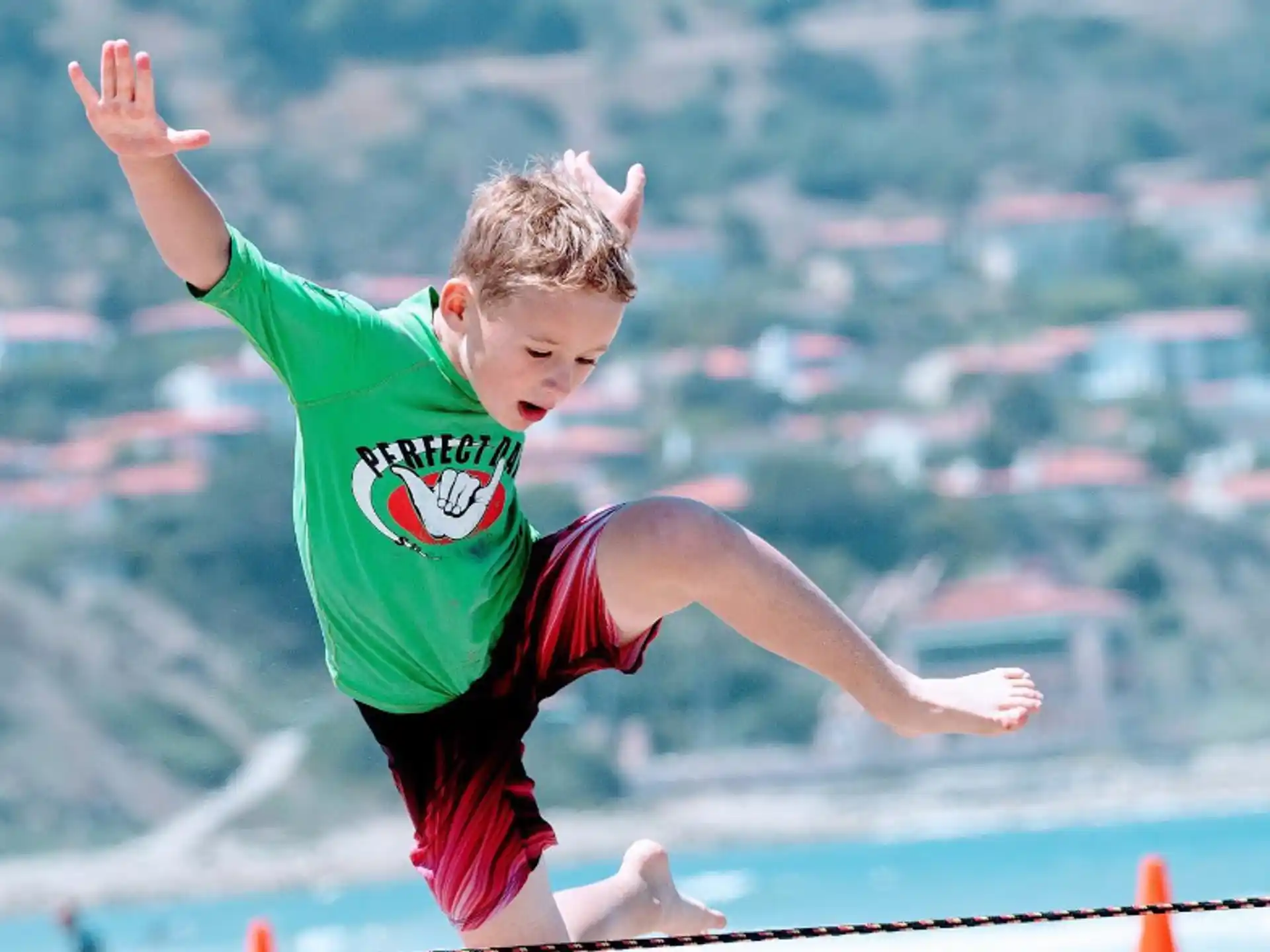 a boy jumping in the air