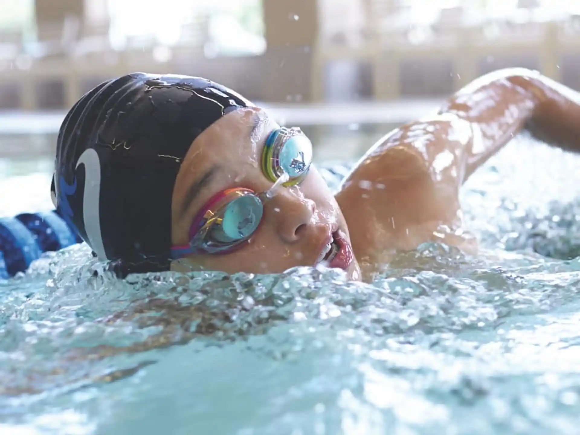 a person swimming in a pool