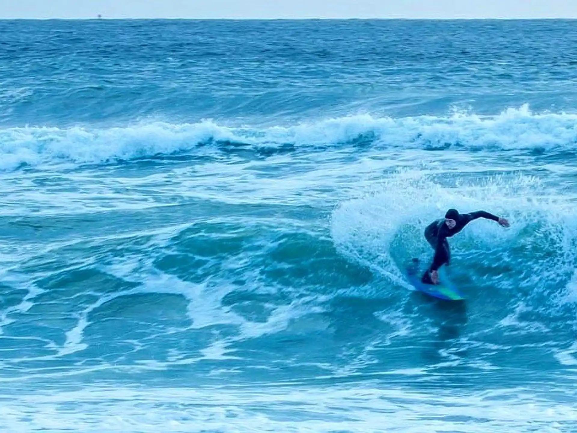 a surfer riding a wave