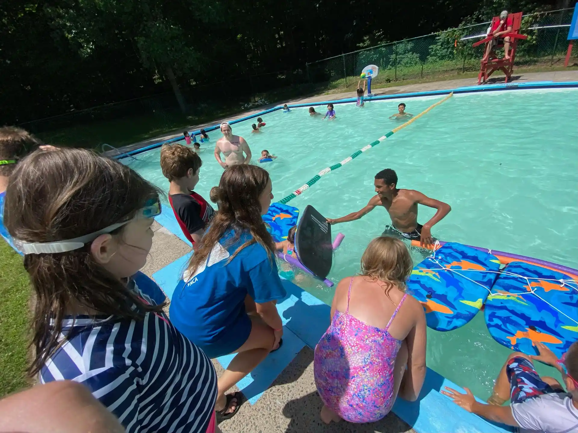 a group of people in a pool