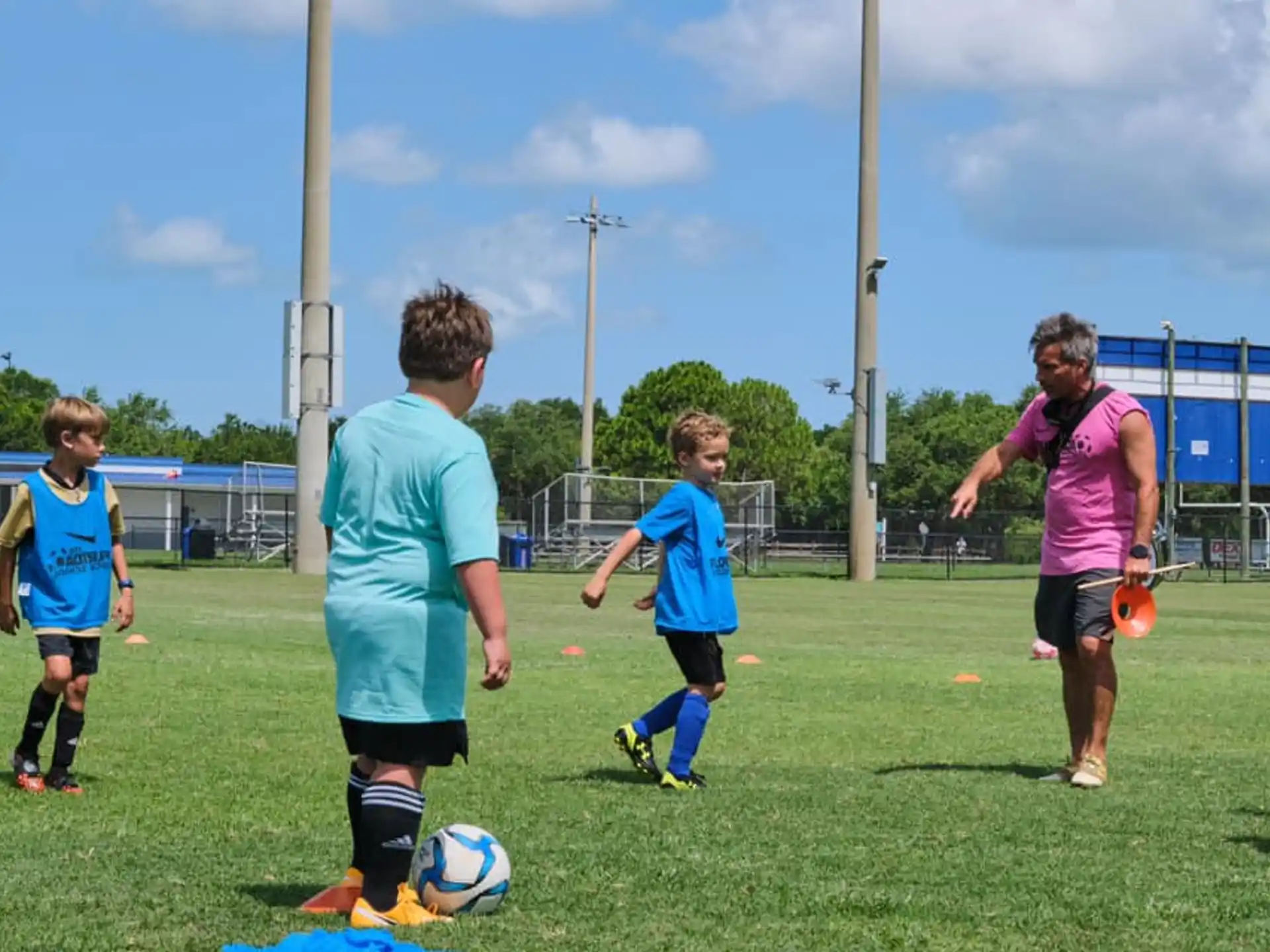 a group of kids playing football
