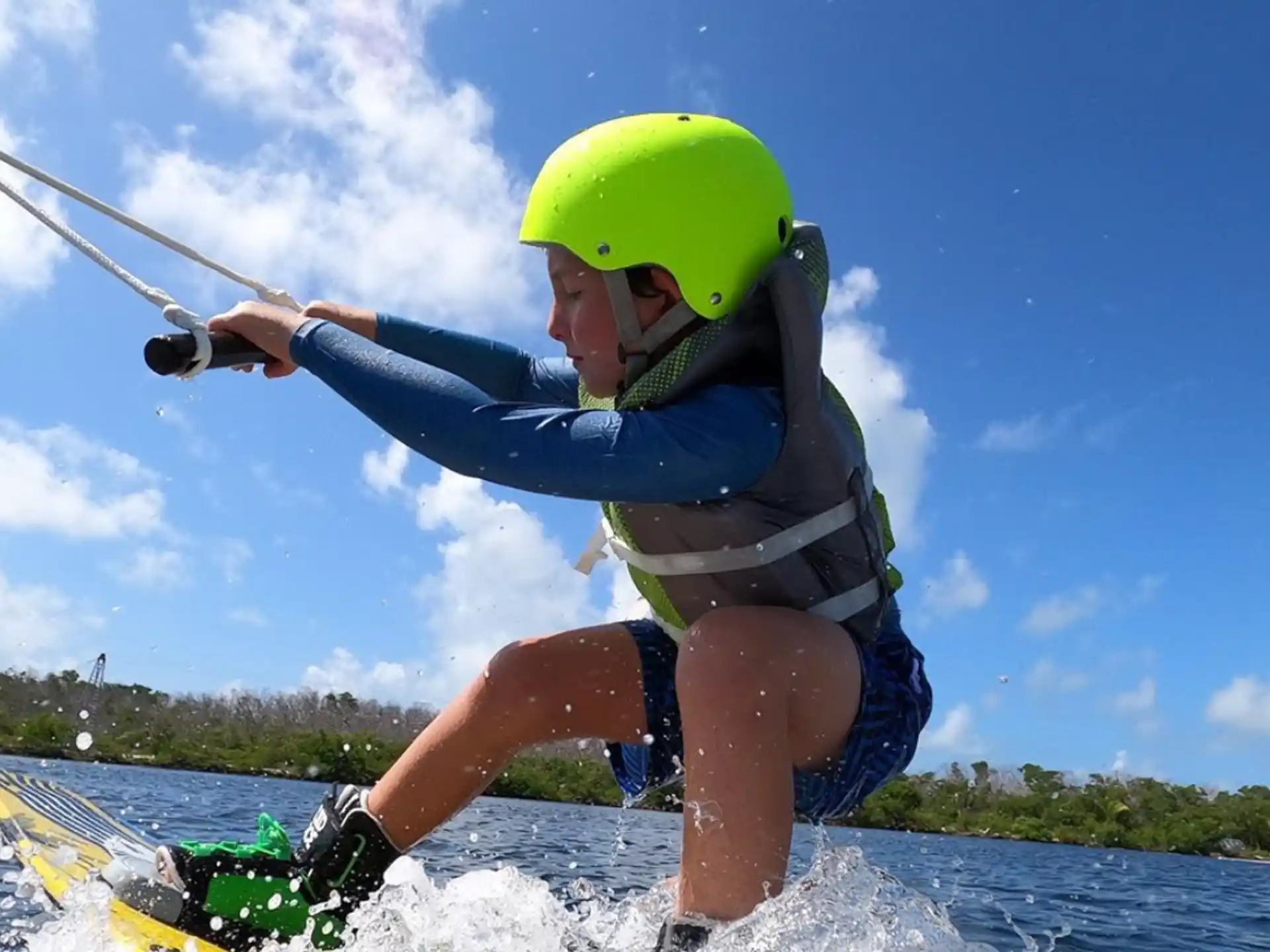 a person wearing a helmet and holding a bow and arrow