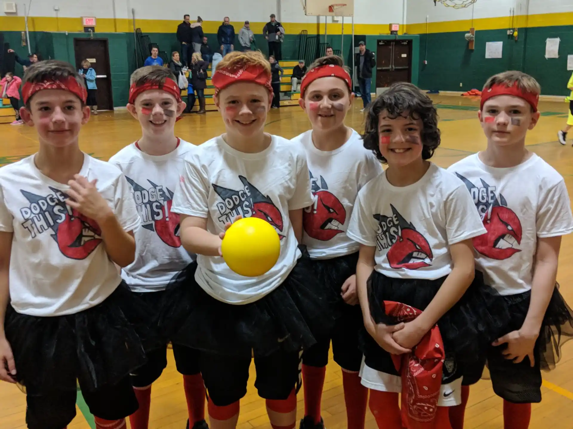 a group of boys in a gym