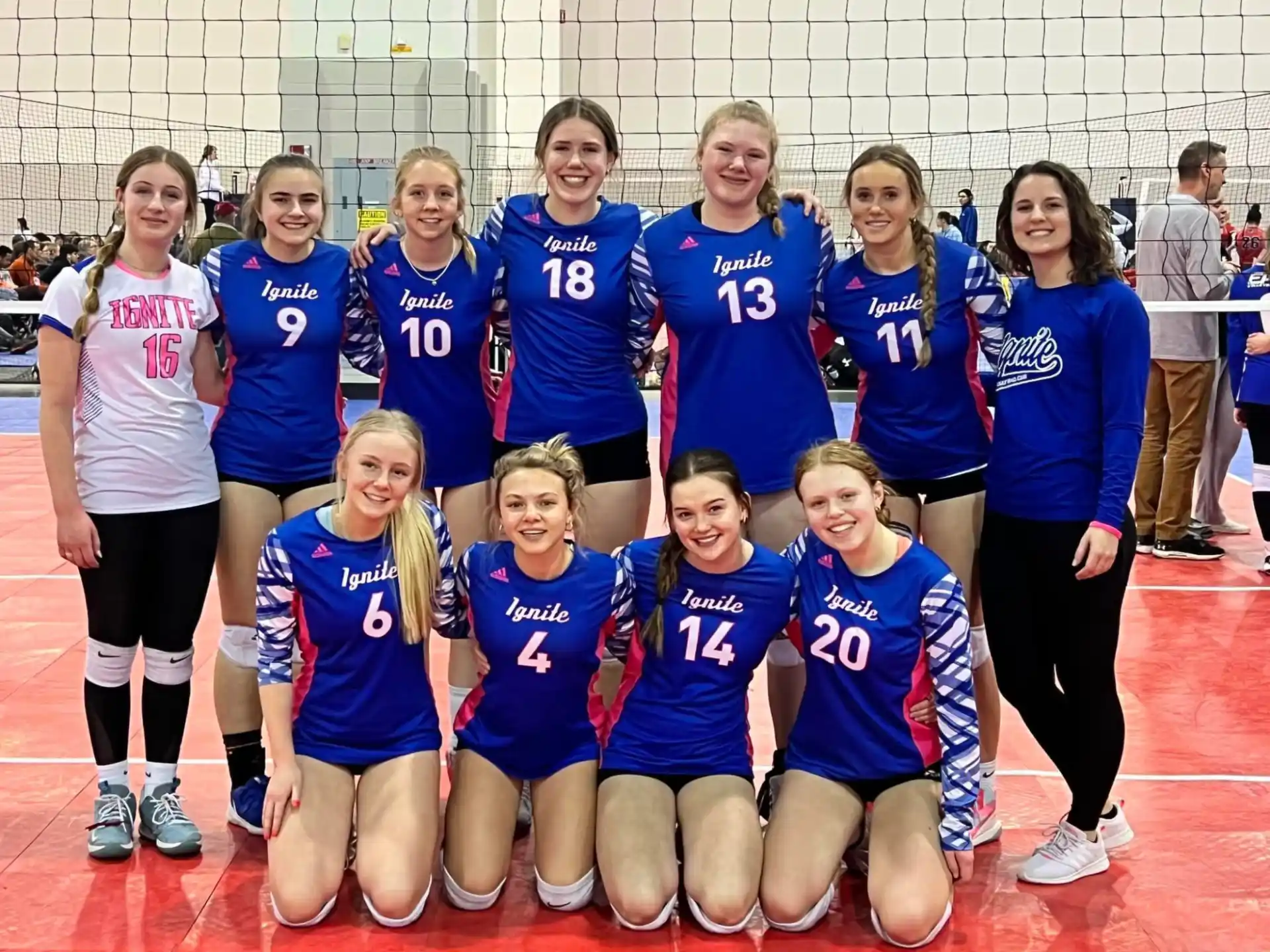 a group of girls in blue uniforms