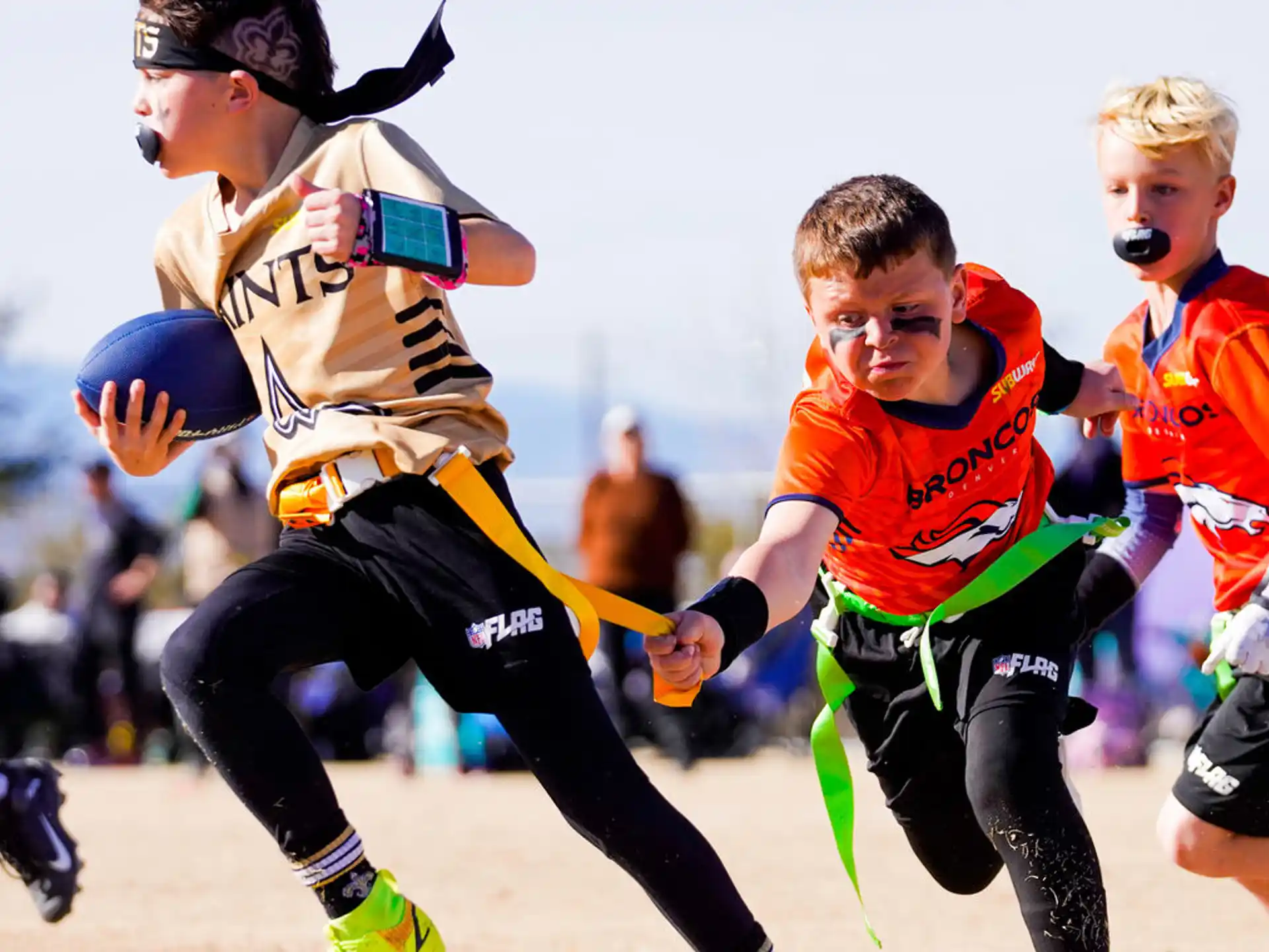 a group of boys playing football