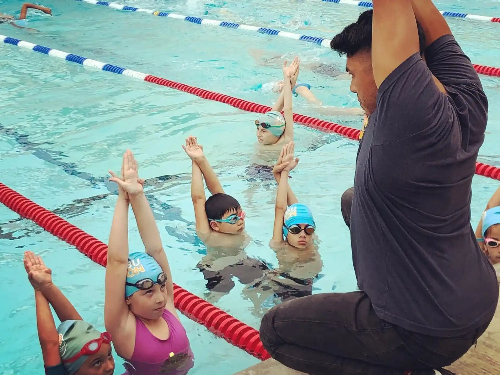a group of people in a pool