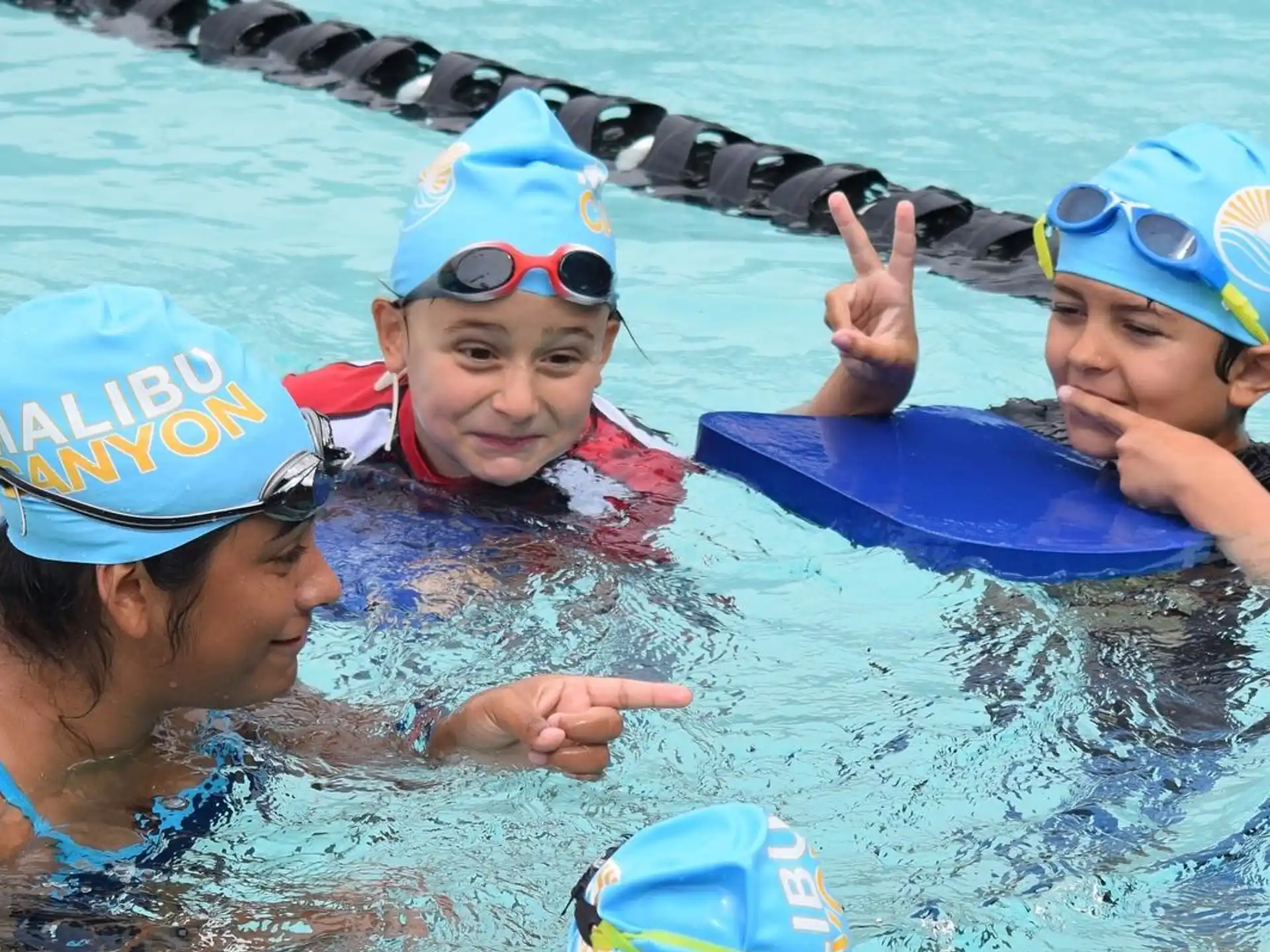 a group of people in a pool