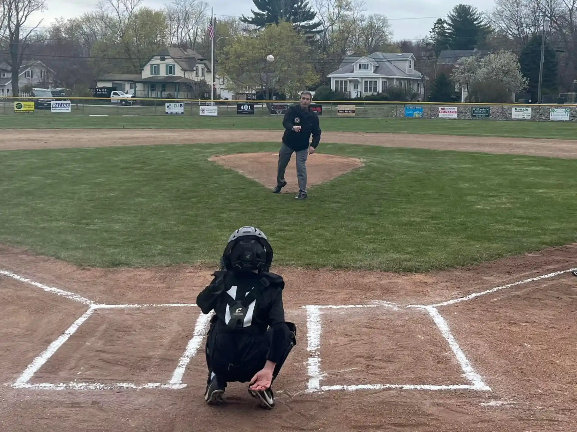a baseball player prepares to swing a bat