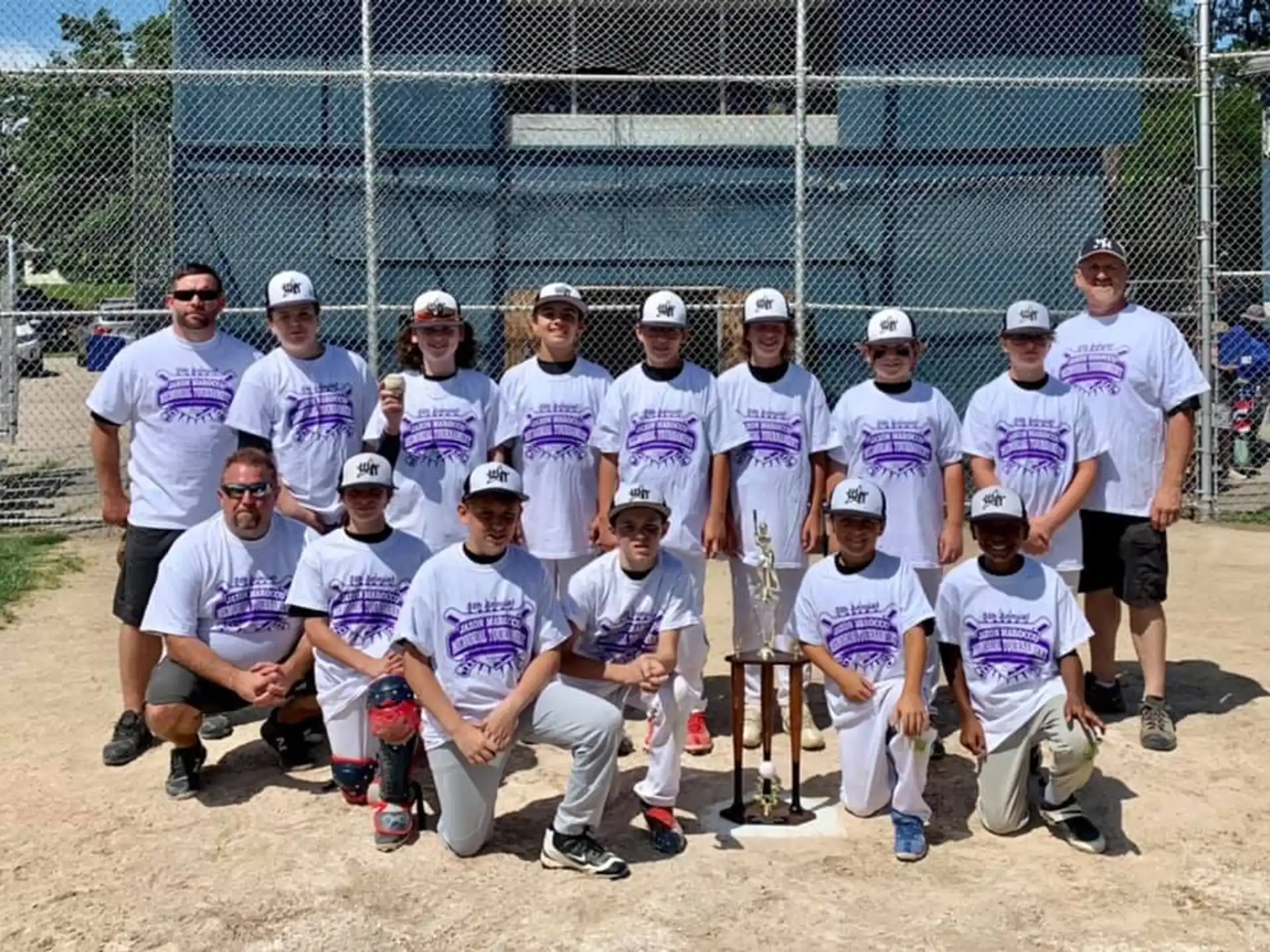 a group of baseball players posing for a photo