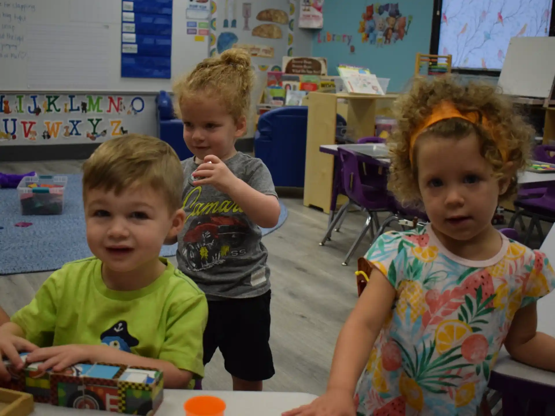 a group of children in a classroom