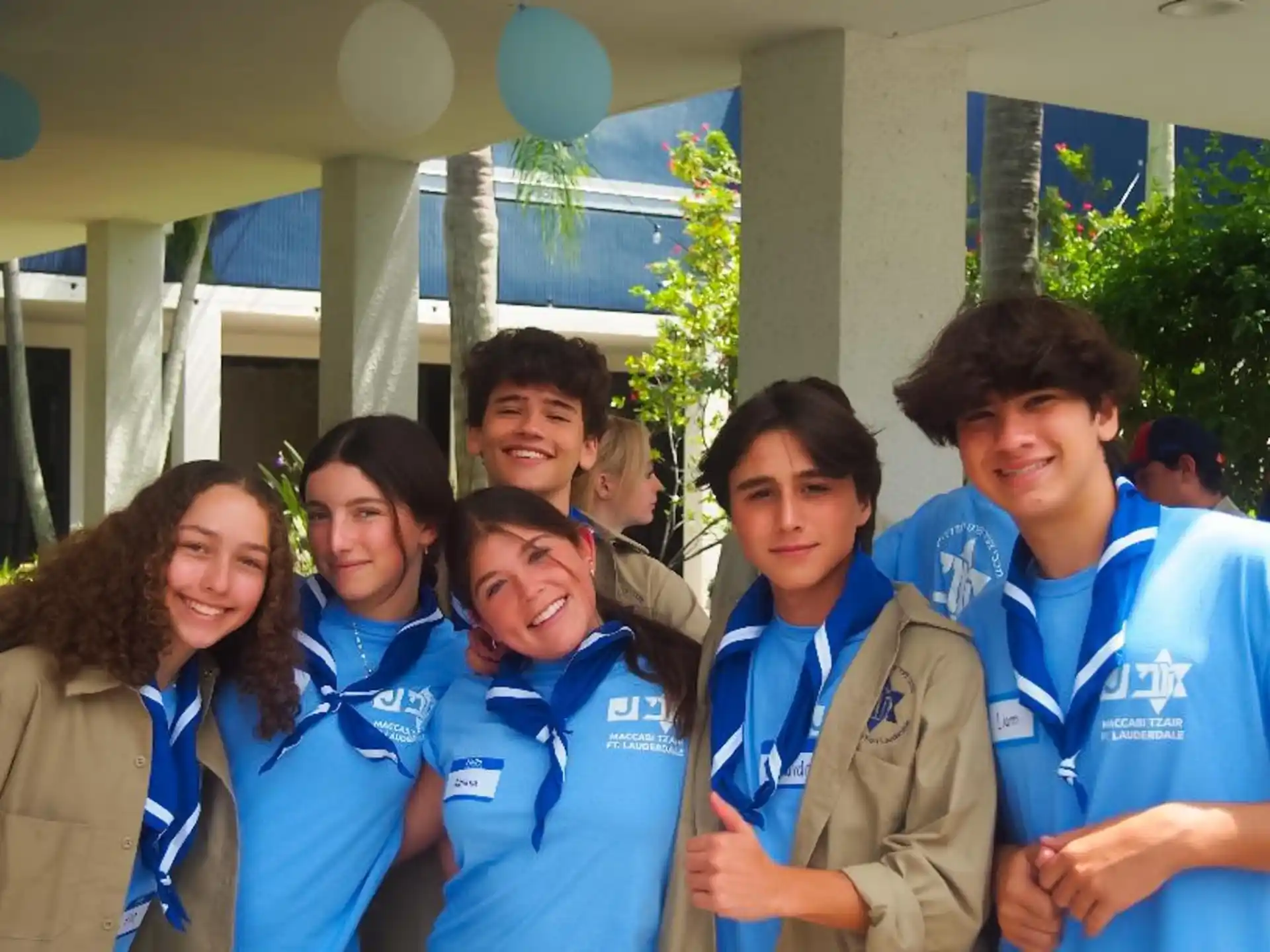 a group of people posing for a photo
