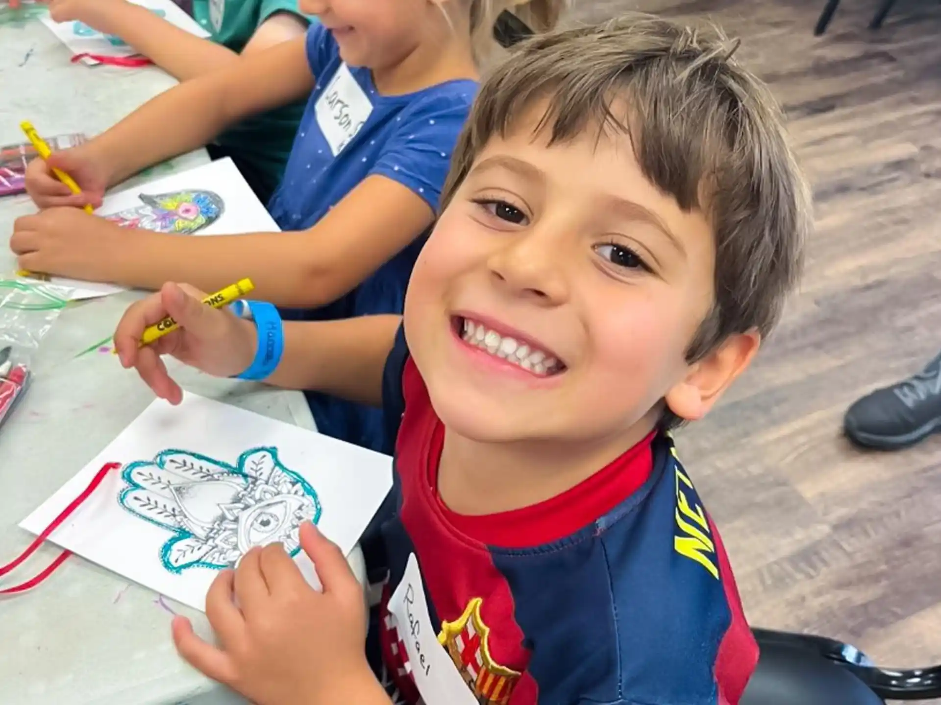 a young boy smiling