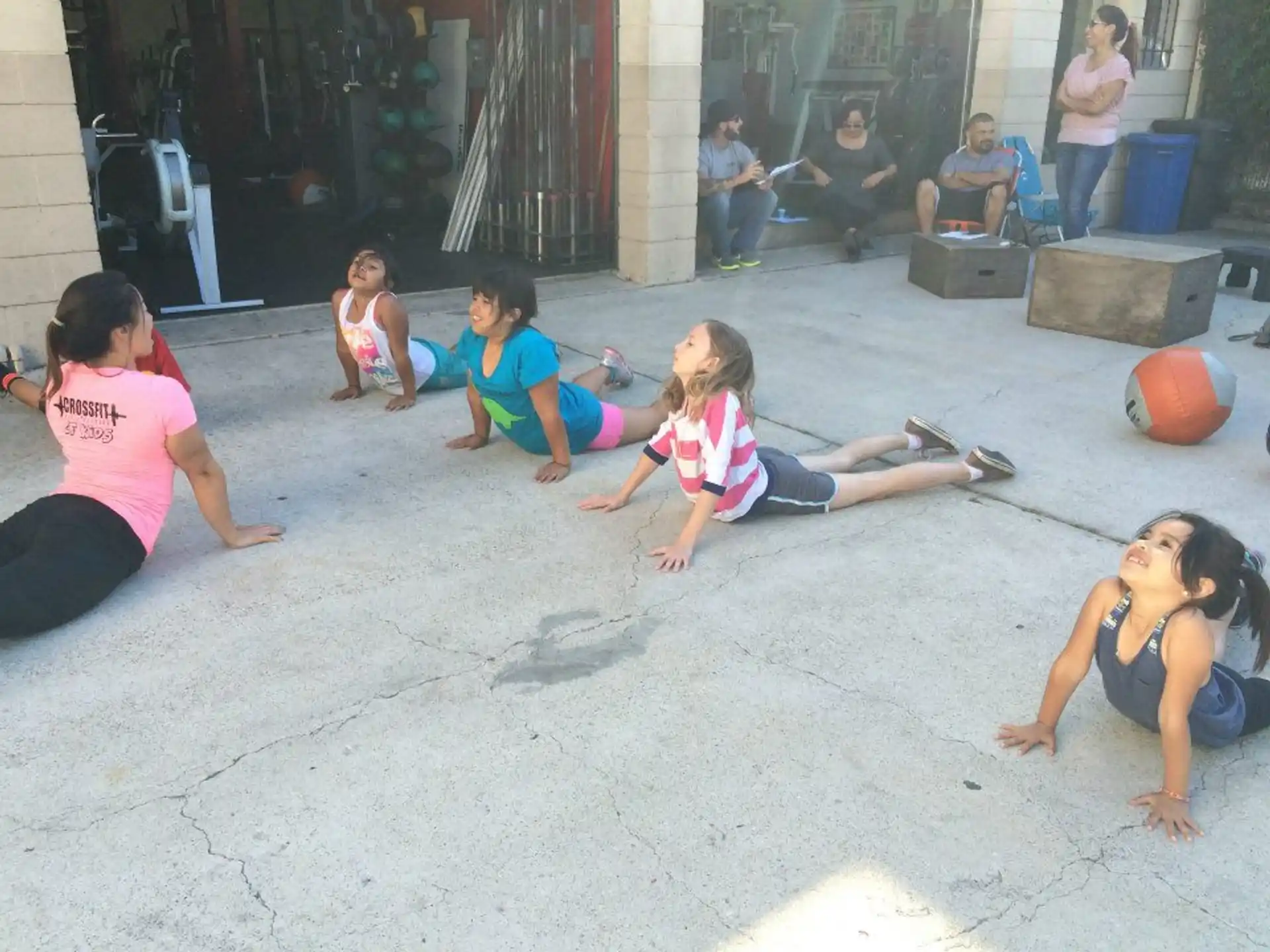 a group of women doing yoga