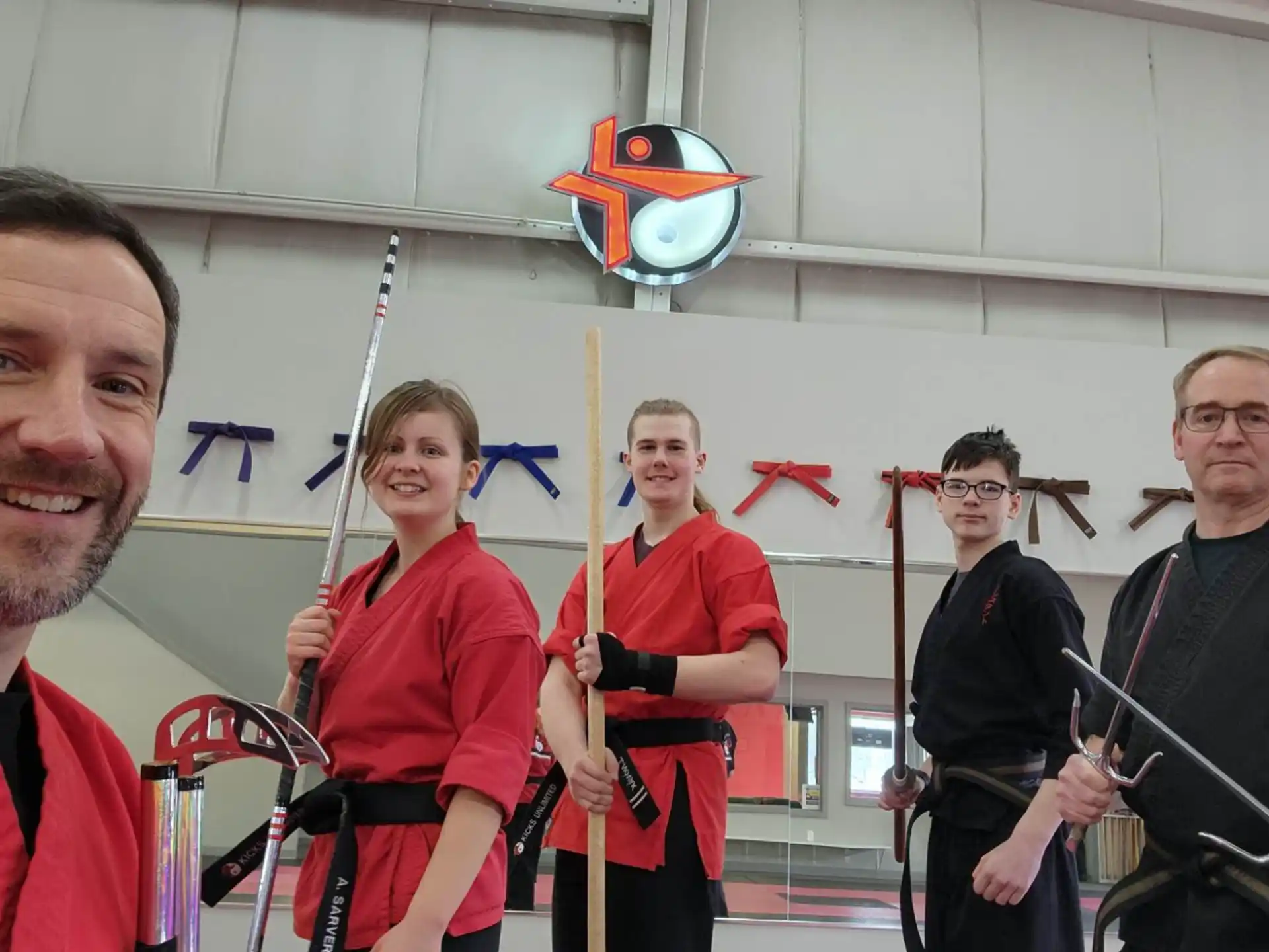 a group of people holding swords