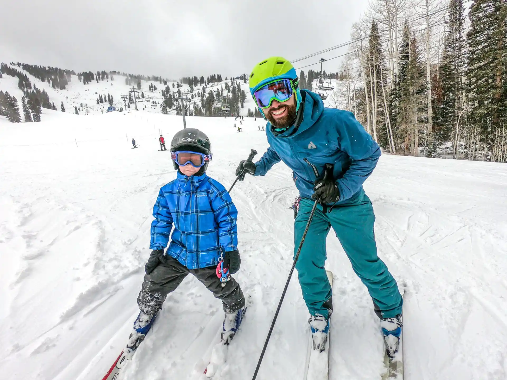 a person and a child skiing