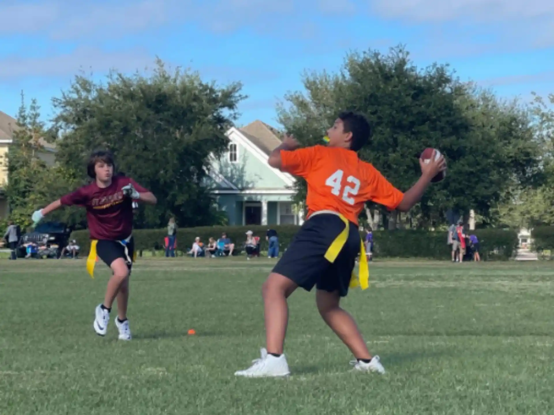 a couple of men playing football