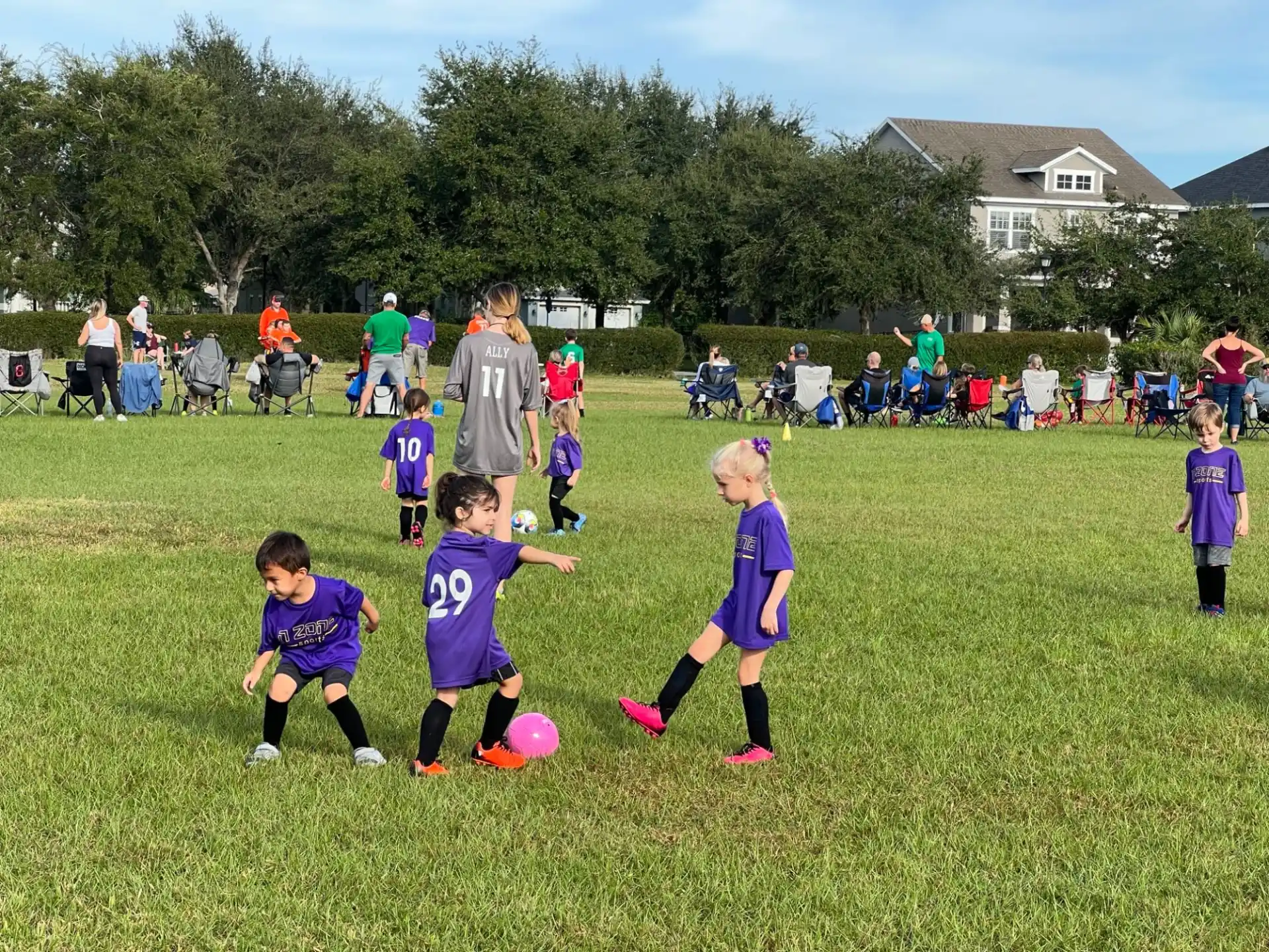 a group of kids playing football