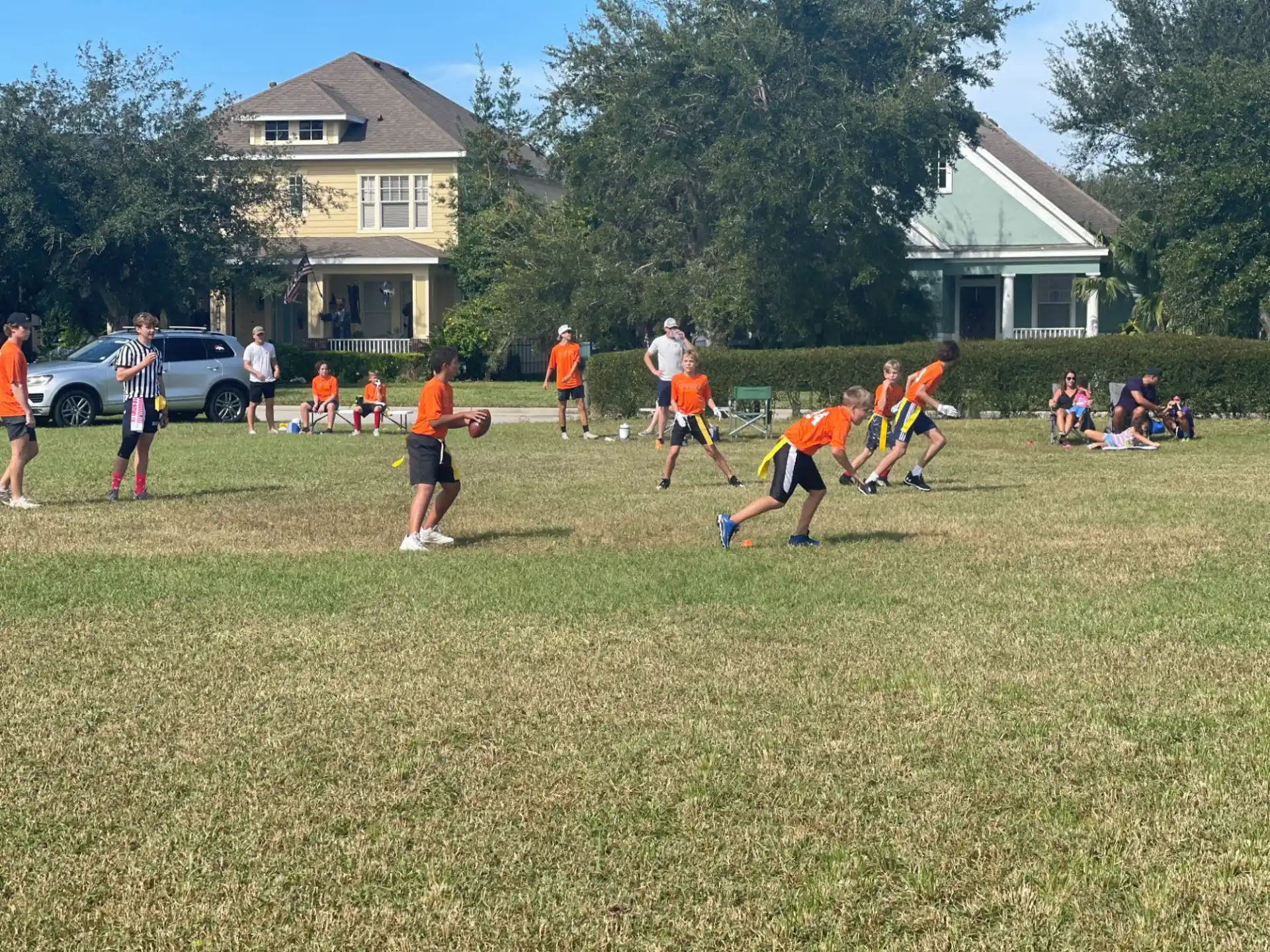 a group of people playing football