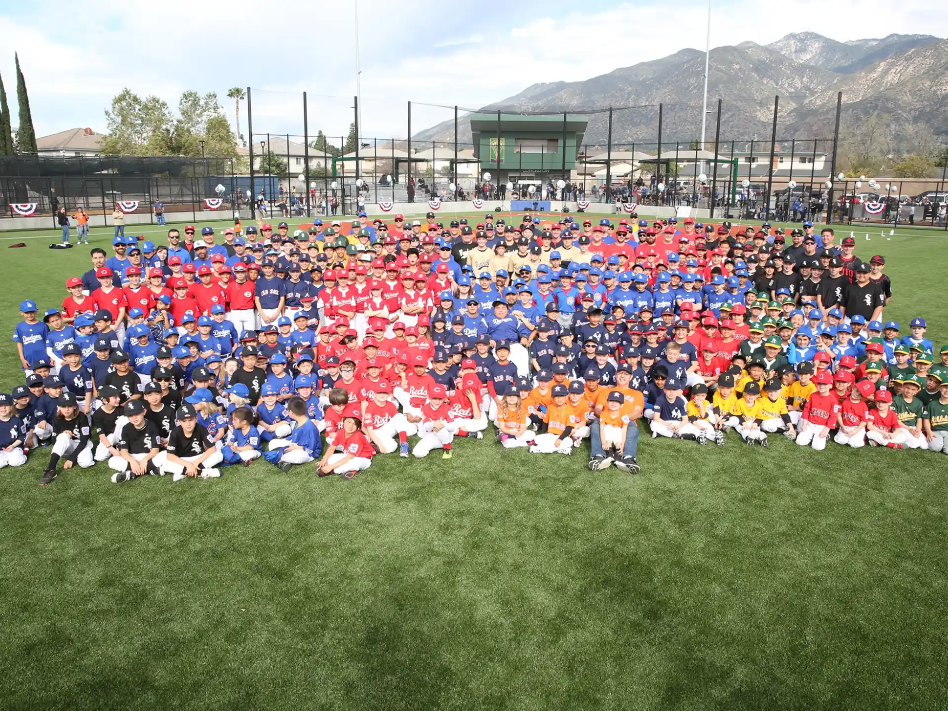 a large group of people posing for a photo