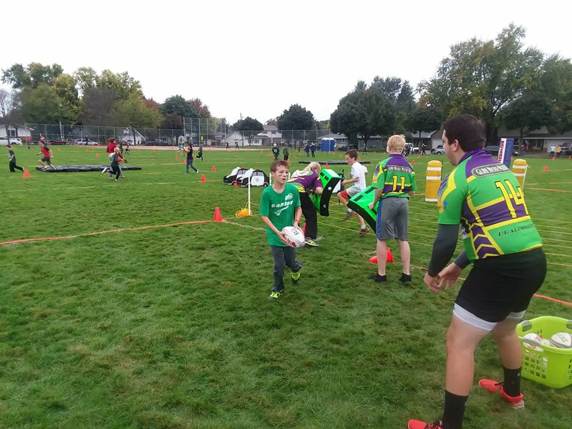 a group of people playing football
